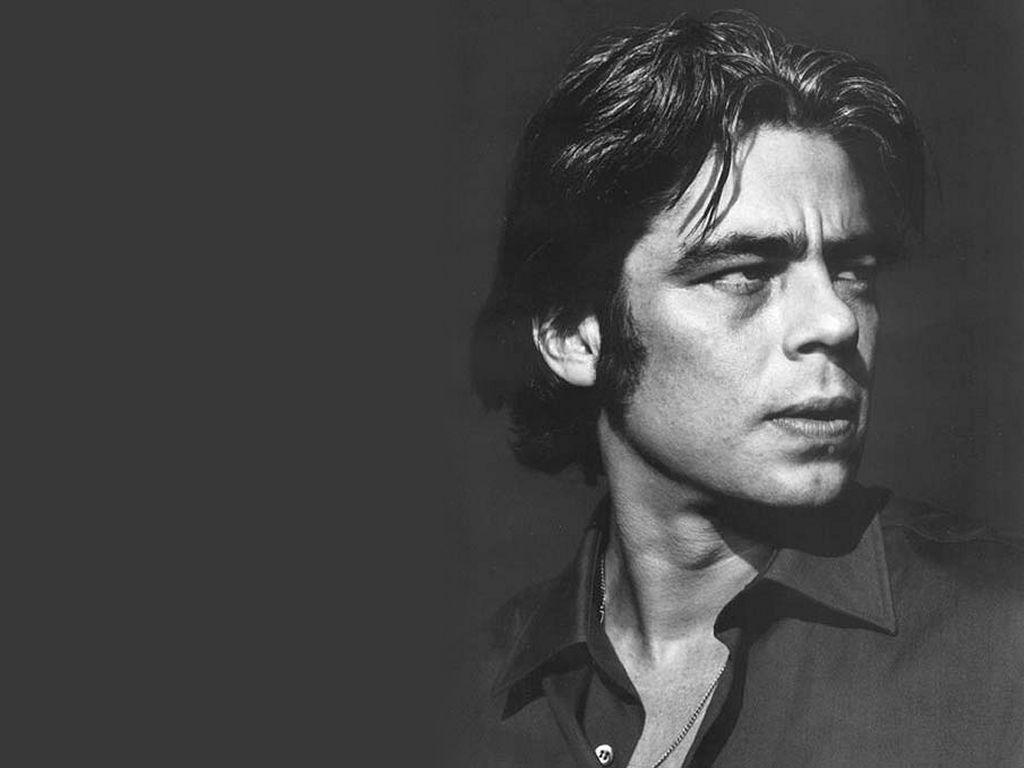 Benicio is one of the few men who looks better with no sleep. Dark