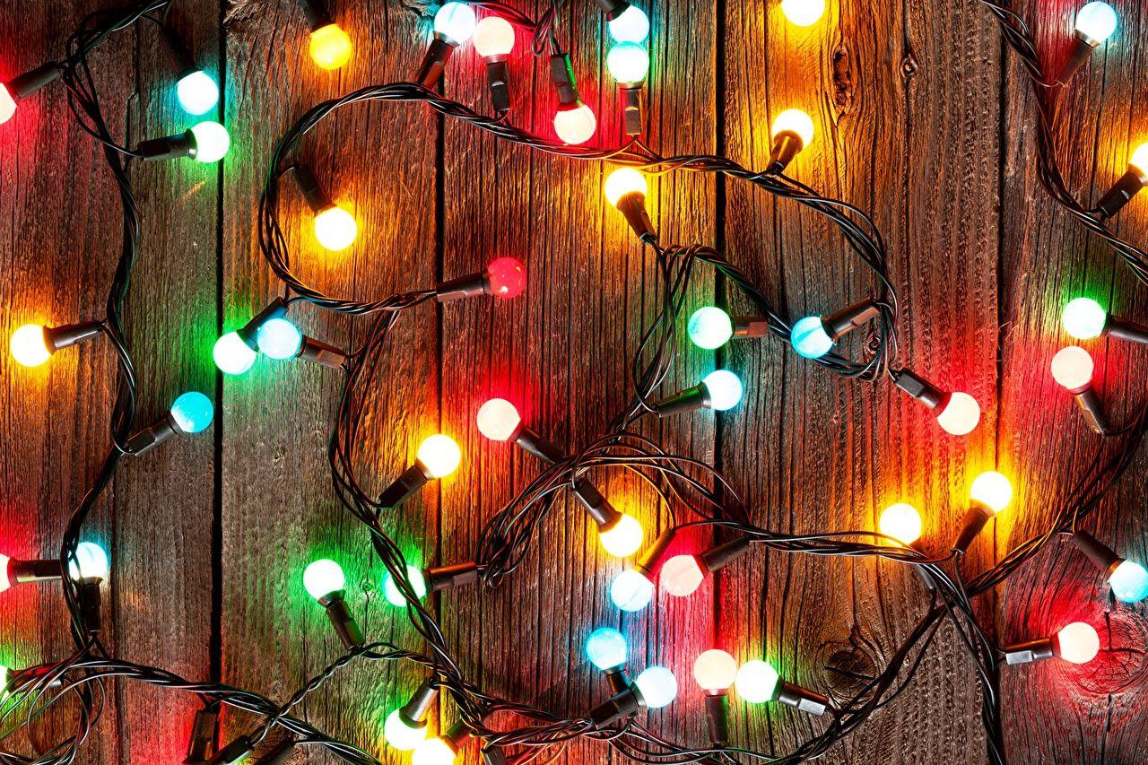 Photos Christmas Fairy lights Closeup Holidays Wood planks