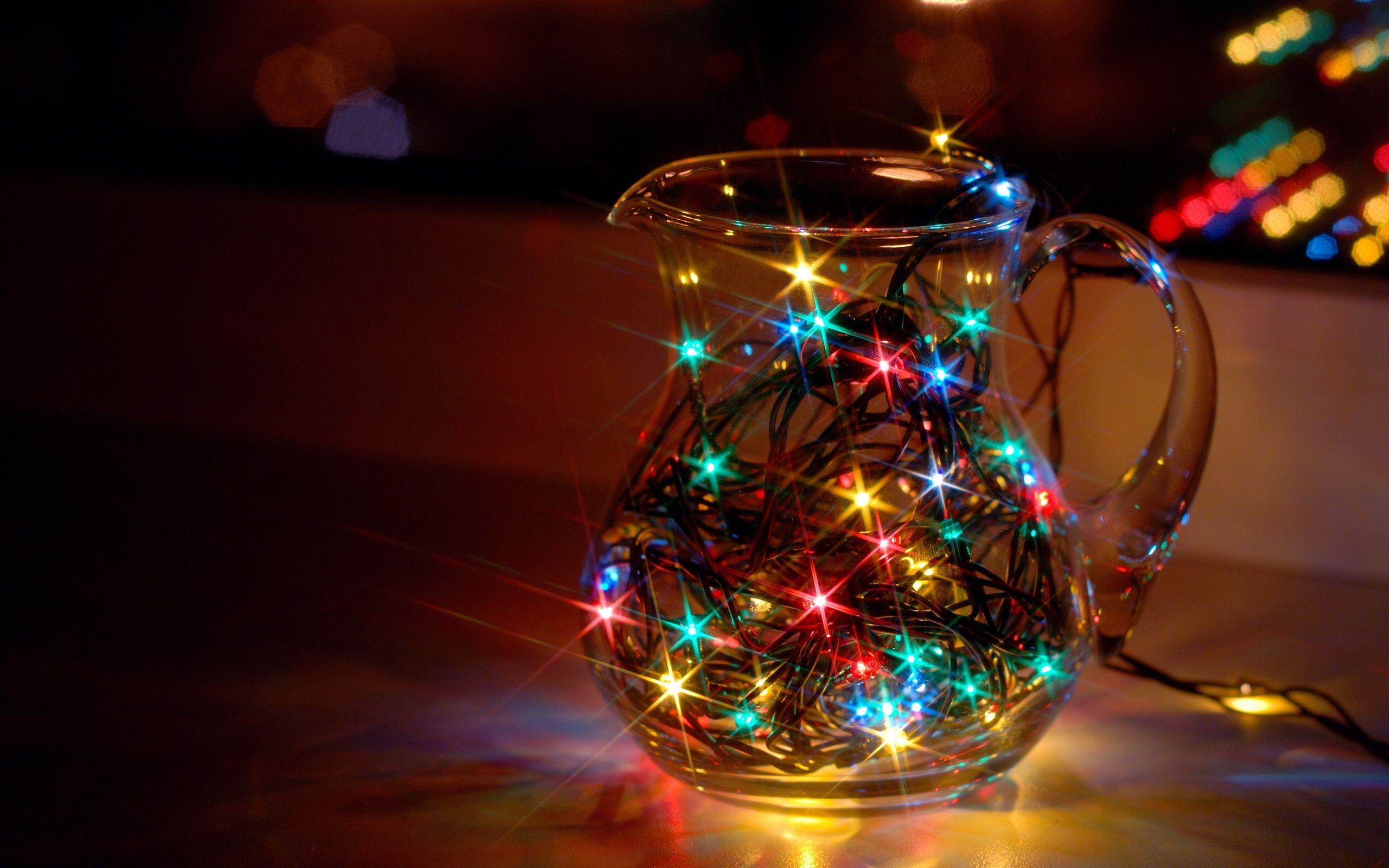 Pictures New year Pitcher Fairy lights Closeup Holidays 2560x1600