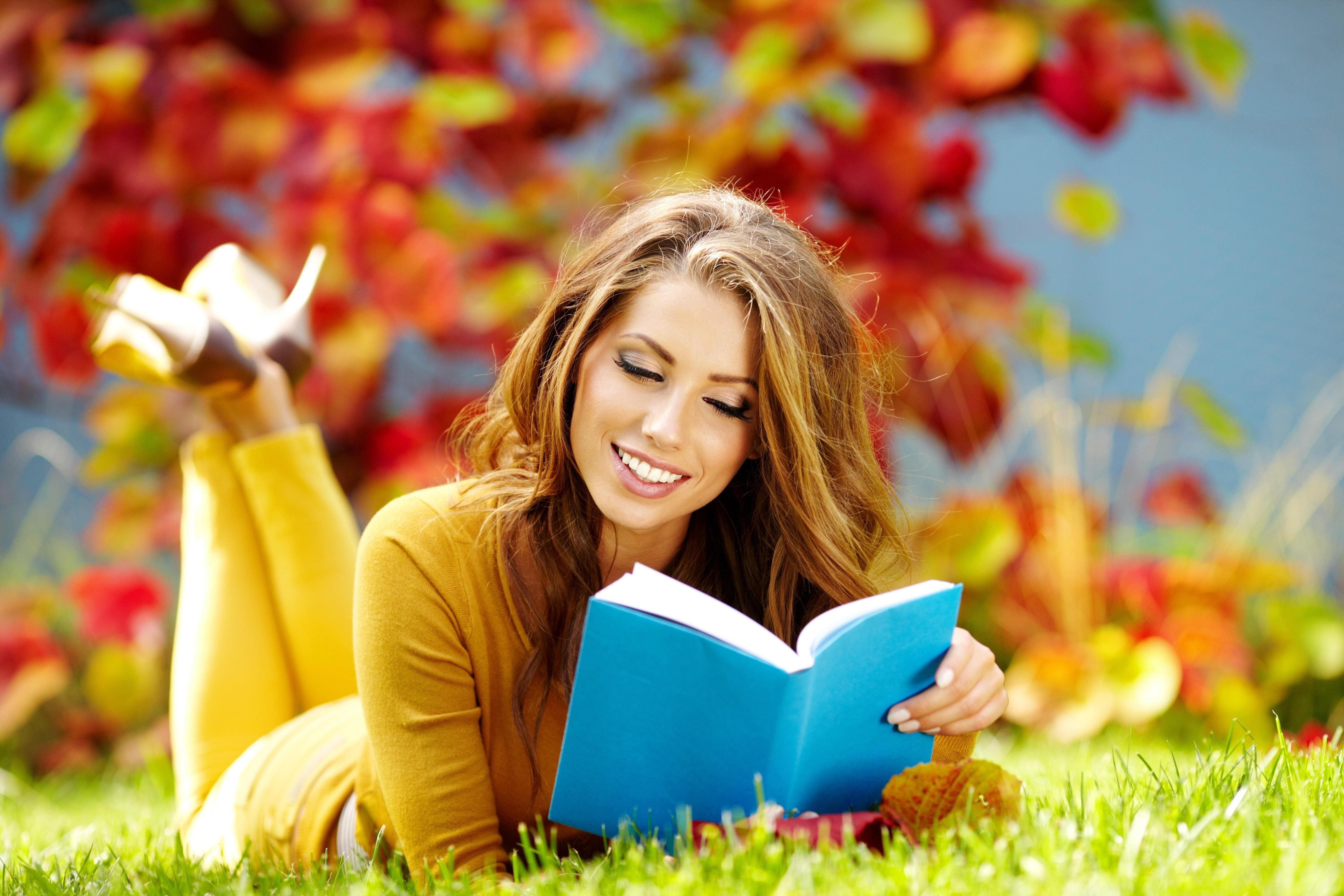 Girl Reading Book in Garden