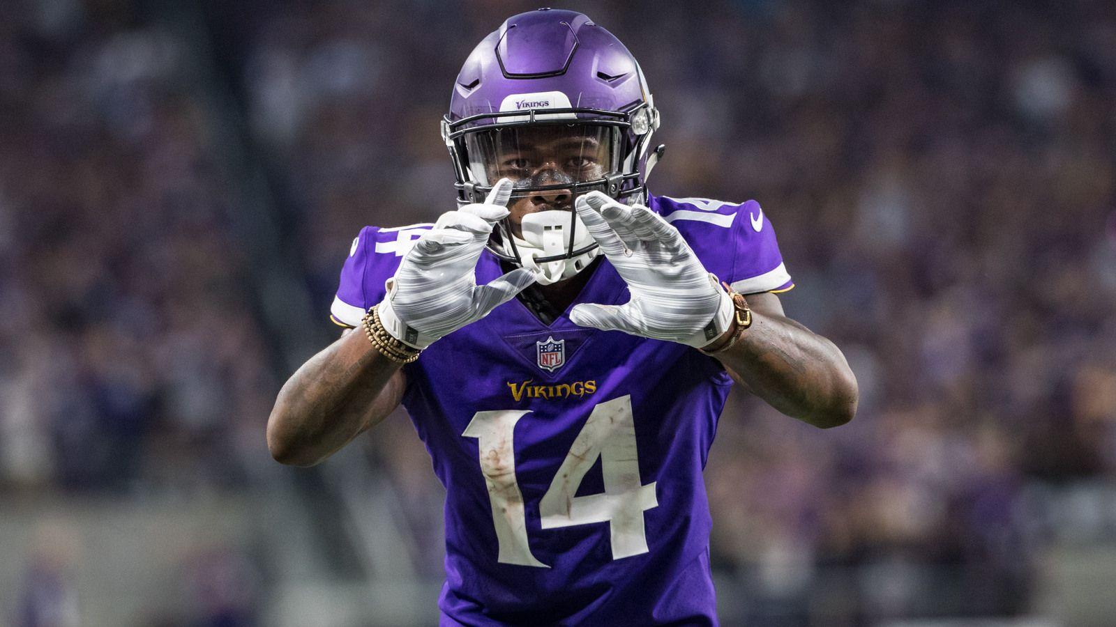 Stefon Diggs punts ball into stands after scoring TD