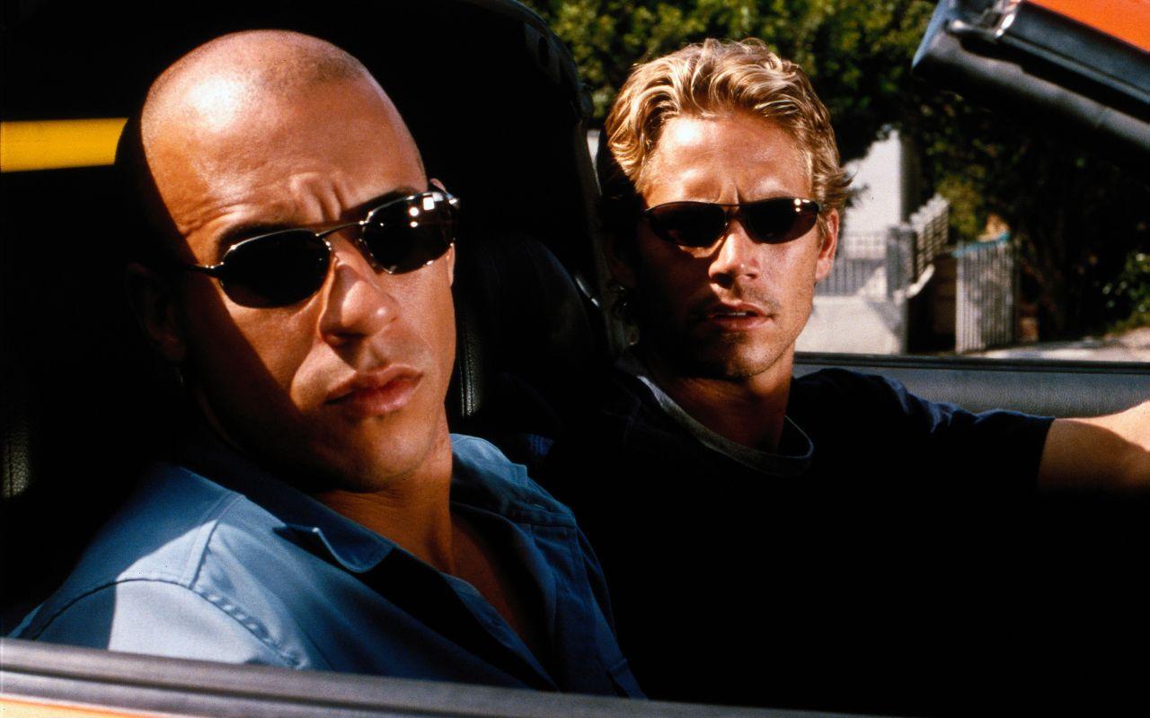 Paul Walker and Vin Diesel in The Fast and the Furious widescreen
