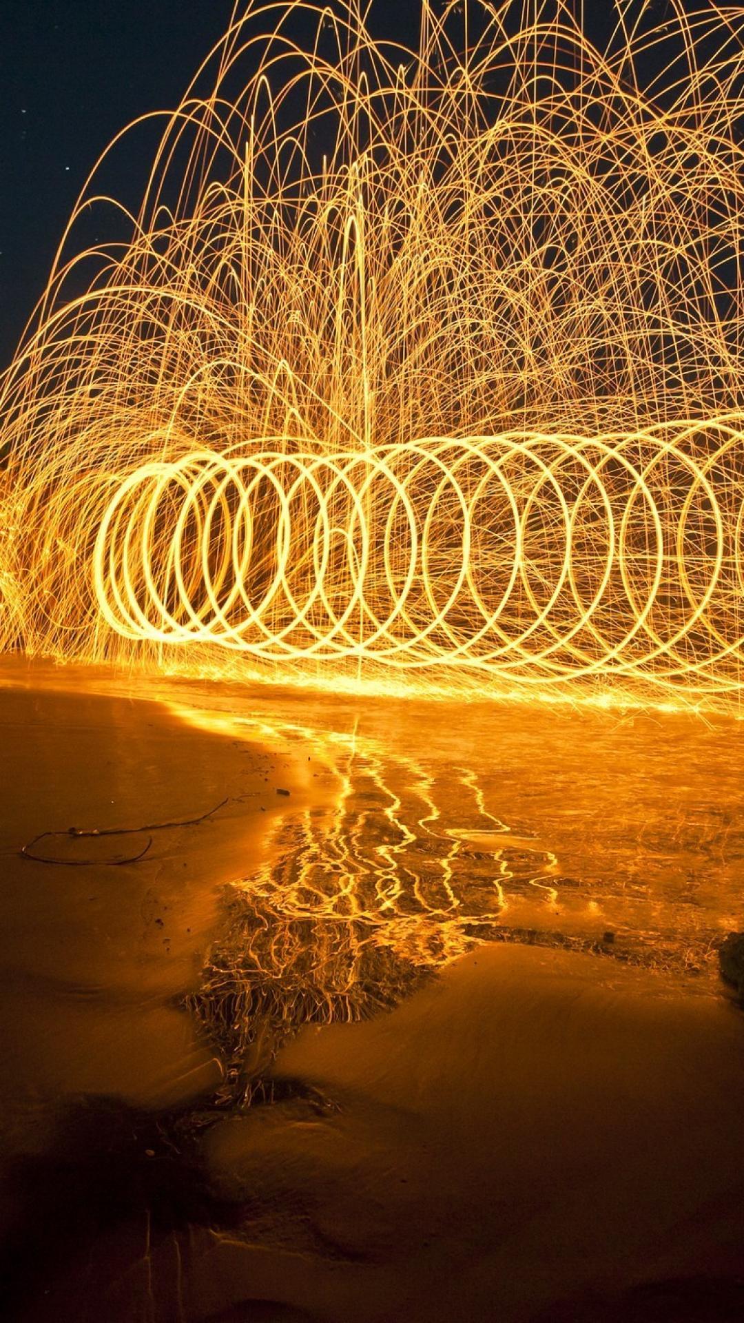 Beach night fire circles events confusion wallpaper