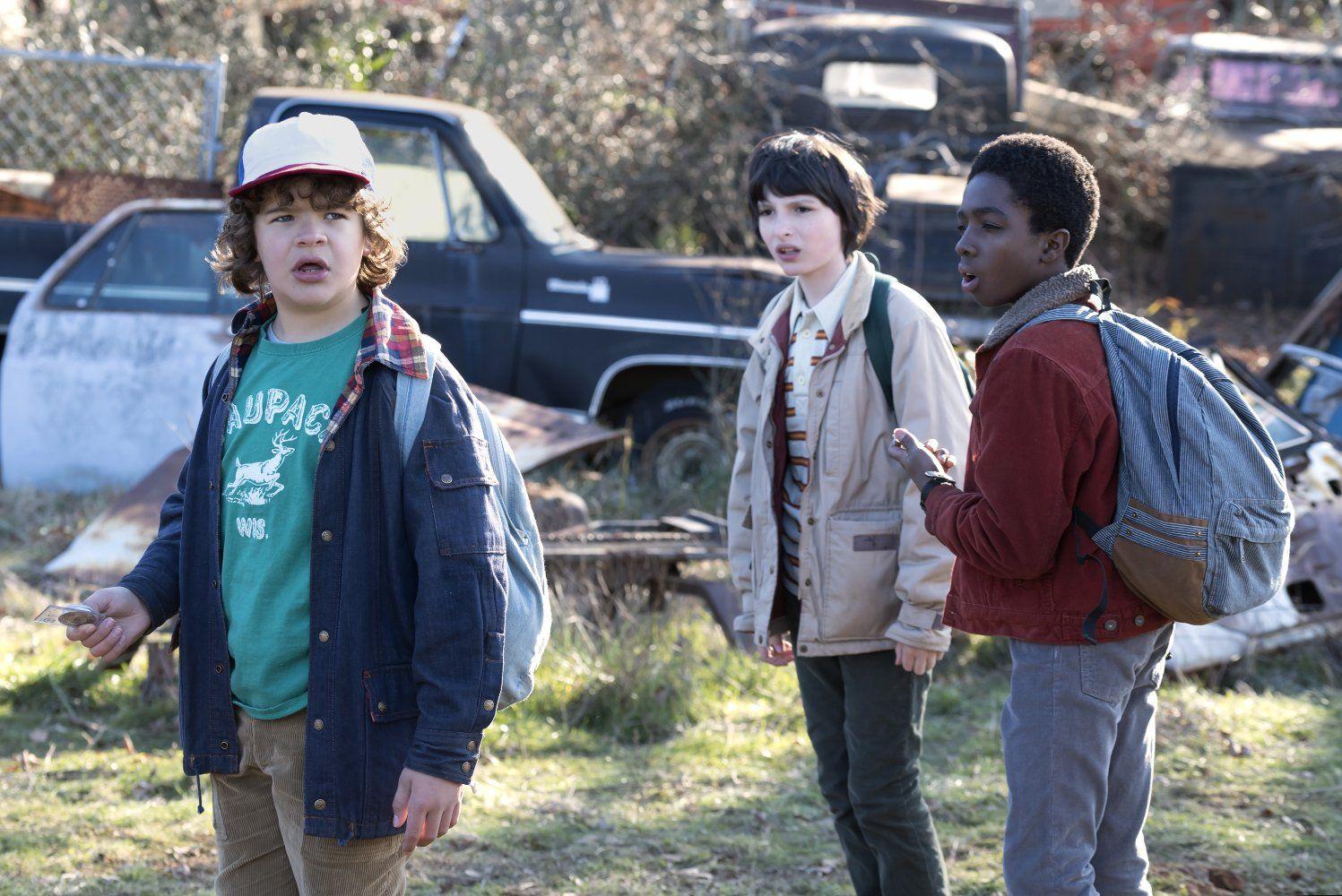 Gaten Matarazzo, Finn Wolfhard, and Caleb McLaughlin as Dustin