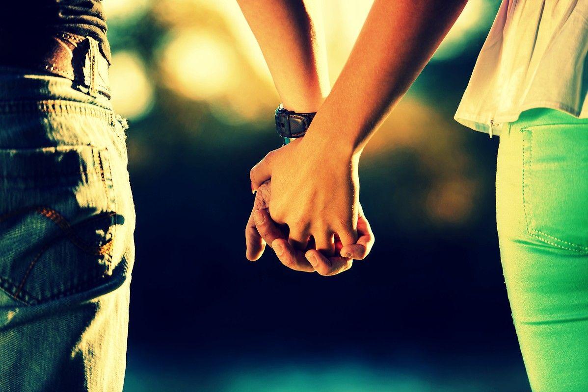 Couple Holding Hands Wallpaper