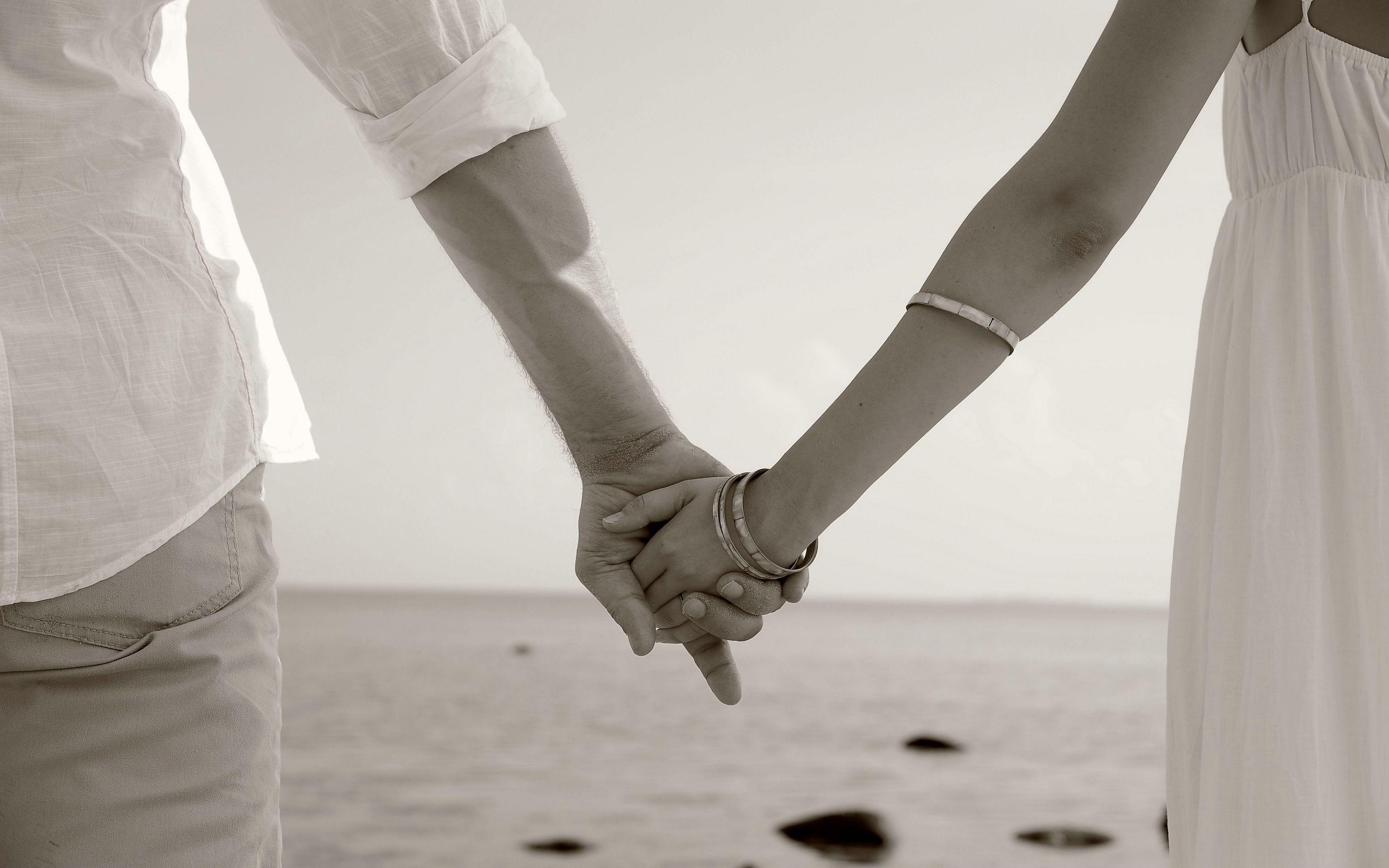 girl and boy holding hands with quotes