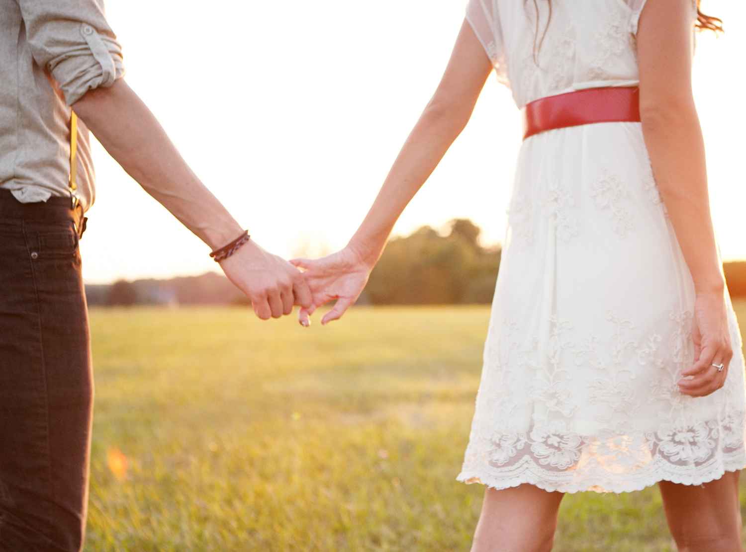 Romantic Cute Couple Holding Hands Wallpaper Green Grass
