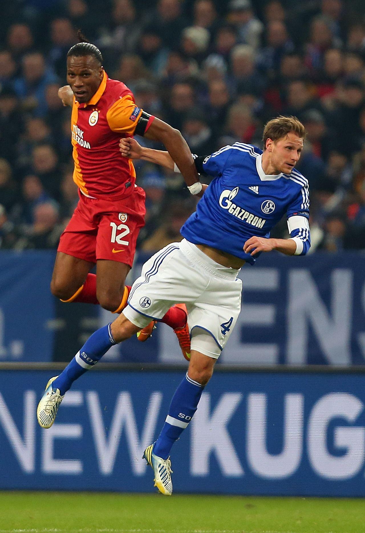 Didier Drogba and Benedikt Höwedes. GALATASARAY S.K