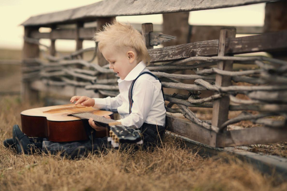 Cute Little Boy With Guitar