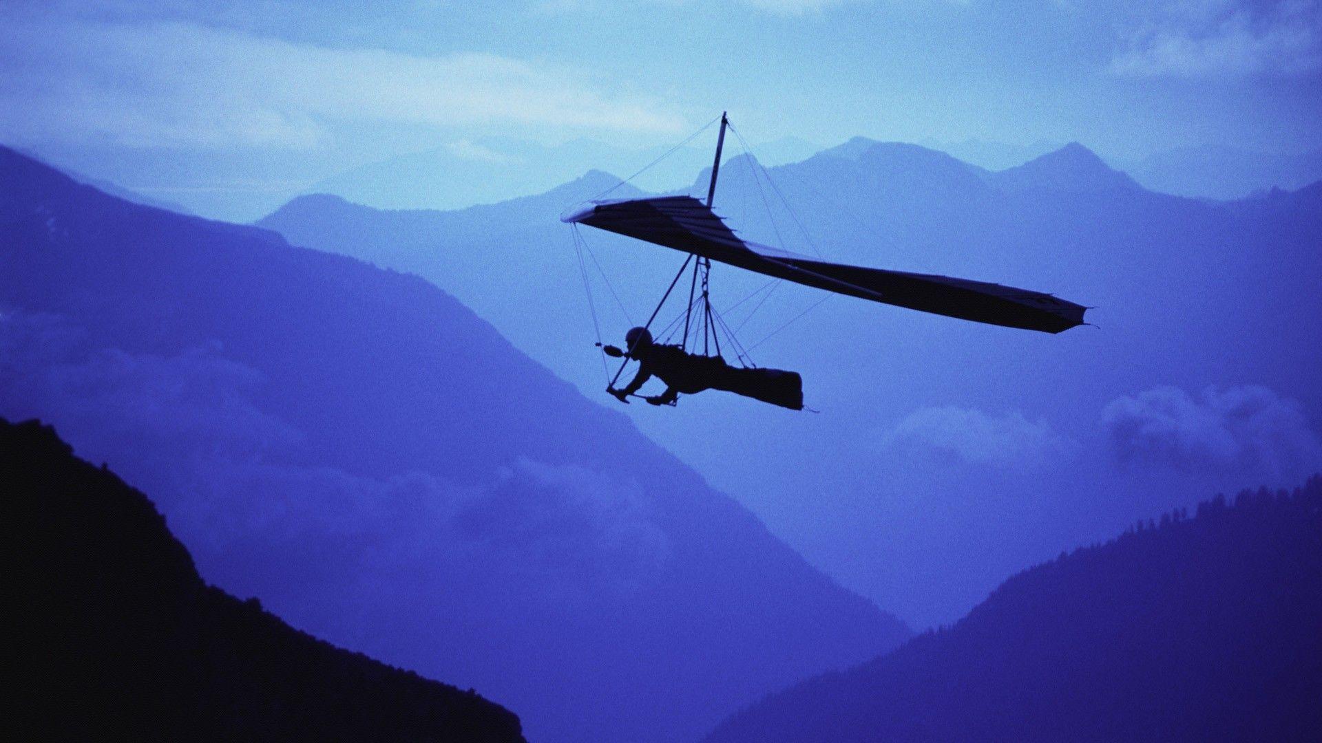 Mountains flying silhouettes glider wallpaperx1080
