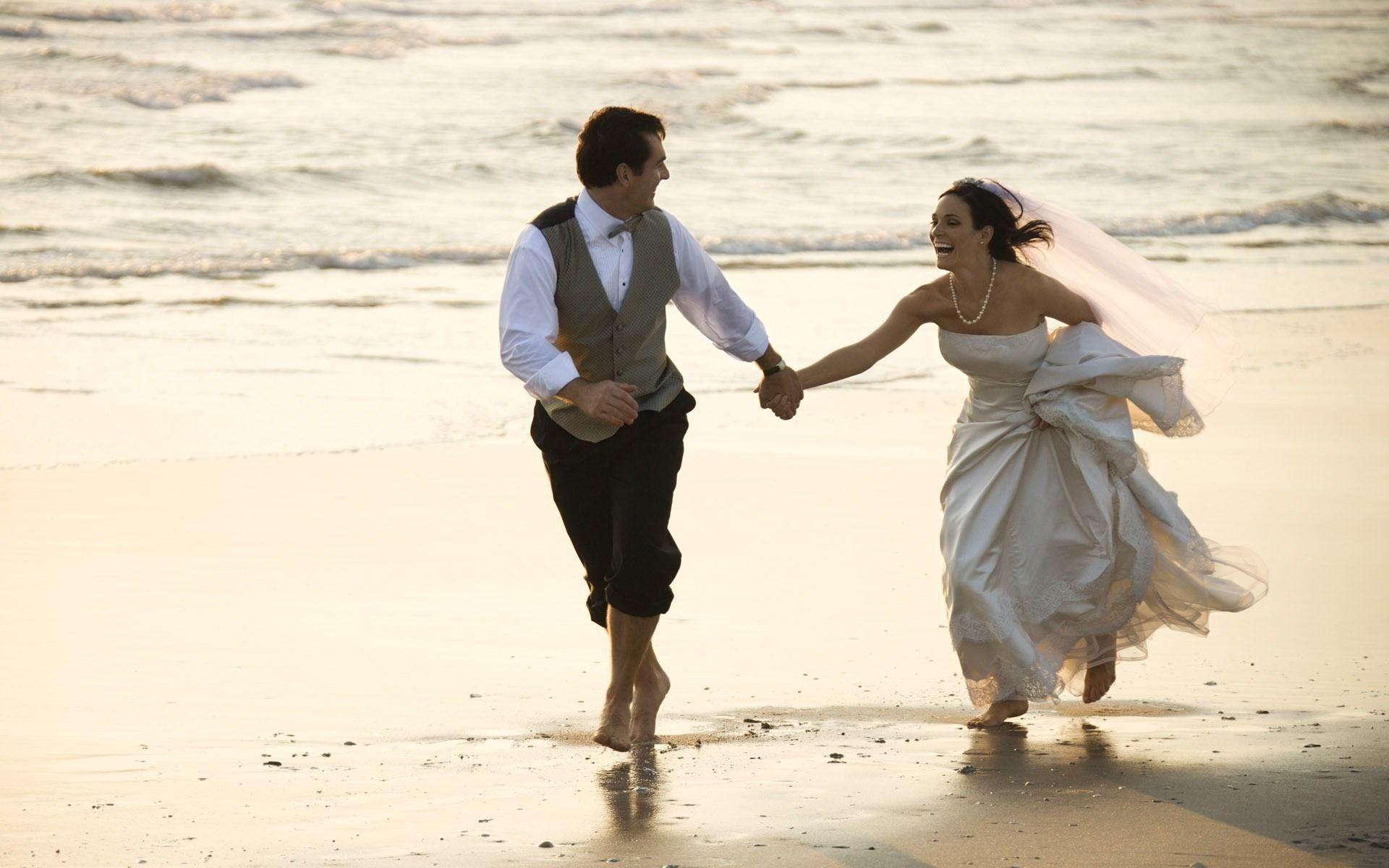 Bride and Groom Running on the Beach widescreen wallpaper. Wide
