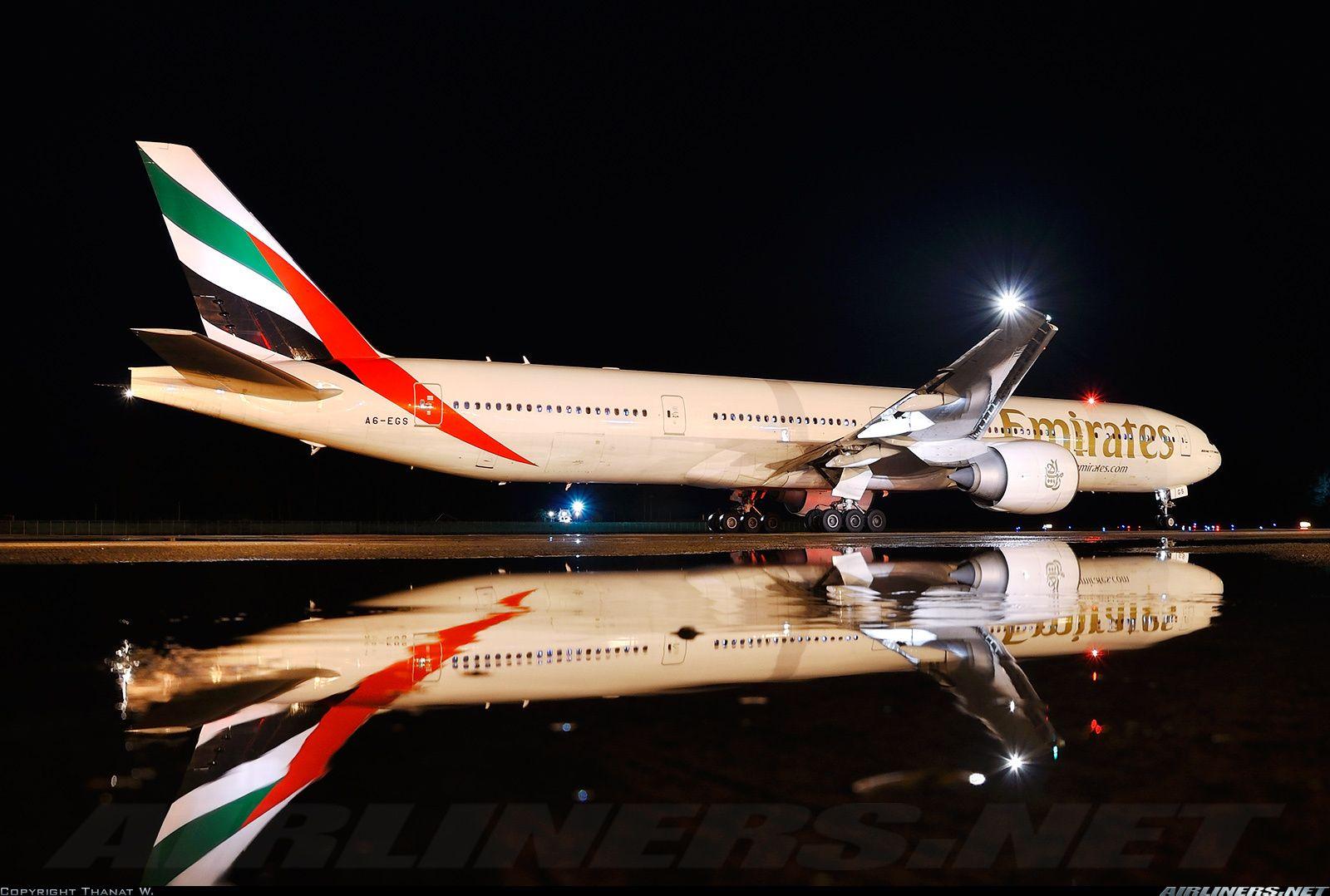 Airliners.net reflection in the water at night of an