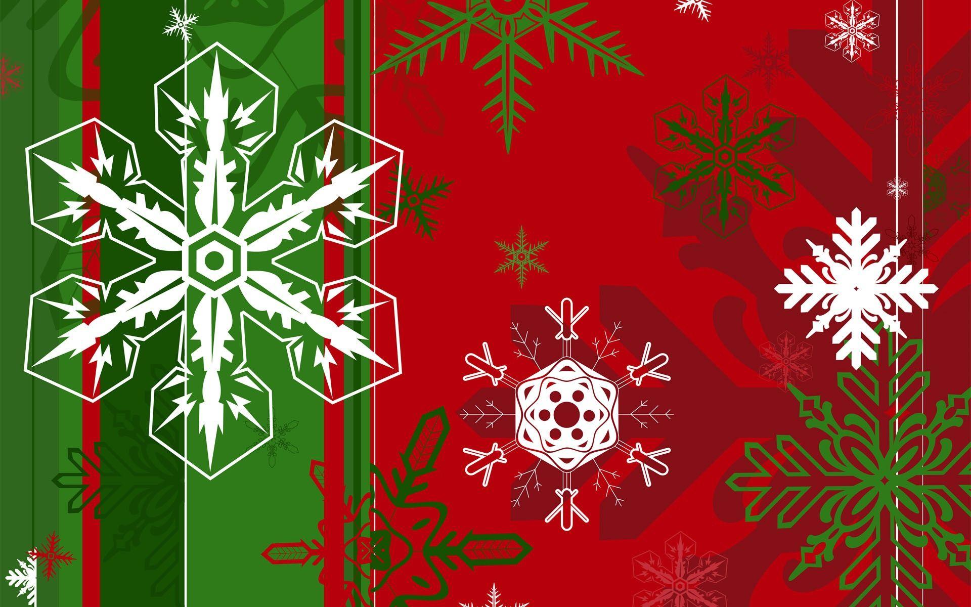 Snowflakes of different shapes on the green and red background
