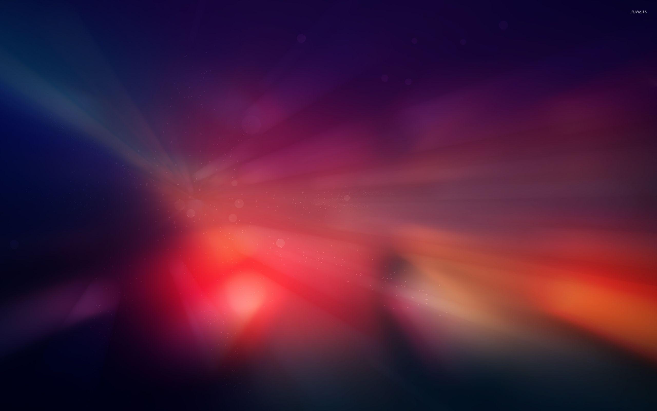 Red sun rays glowing in space wallpaper wallpaper