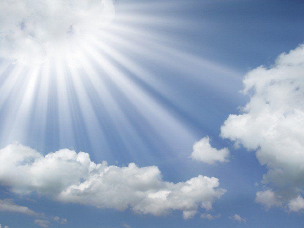 Sun Rays Coming Out Of The Clouds In A Blue Sky Wallpaper. Free