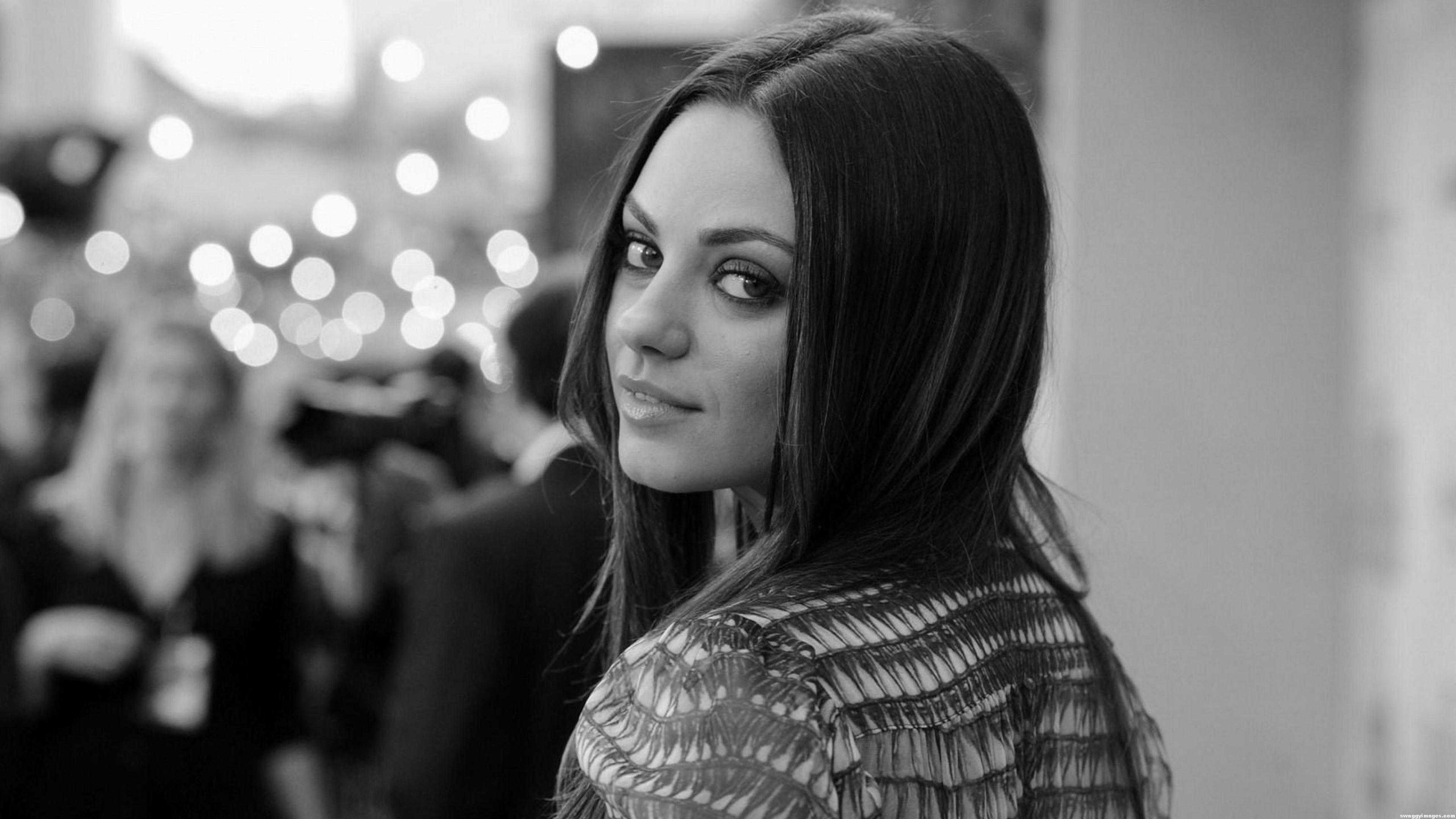 Mila Kunis Wallpaper 1366x768