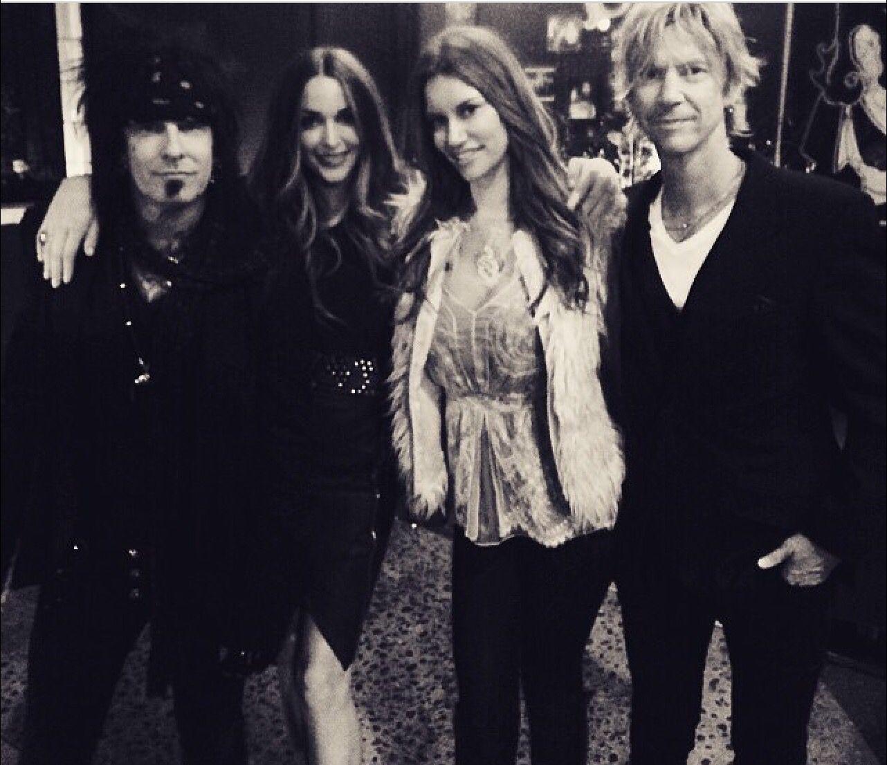 Nikki Sixx & Duff McKagan and theirs wives. Glam 4 U