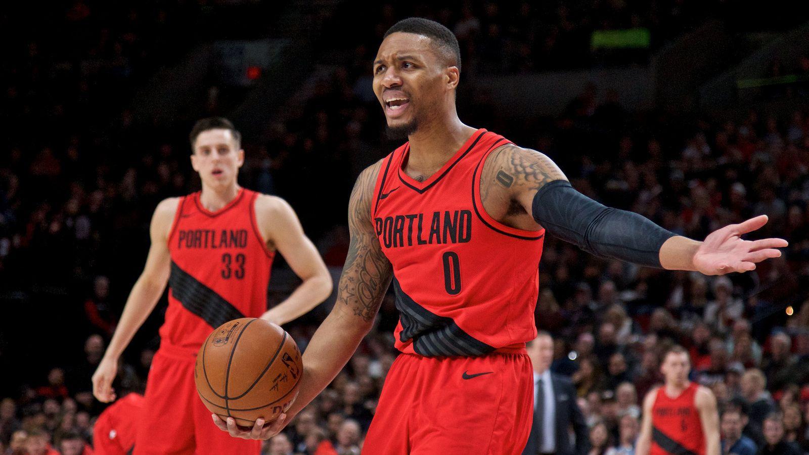 Damian Lillard talks with security over mother's incident with fan