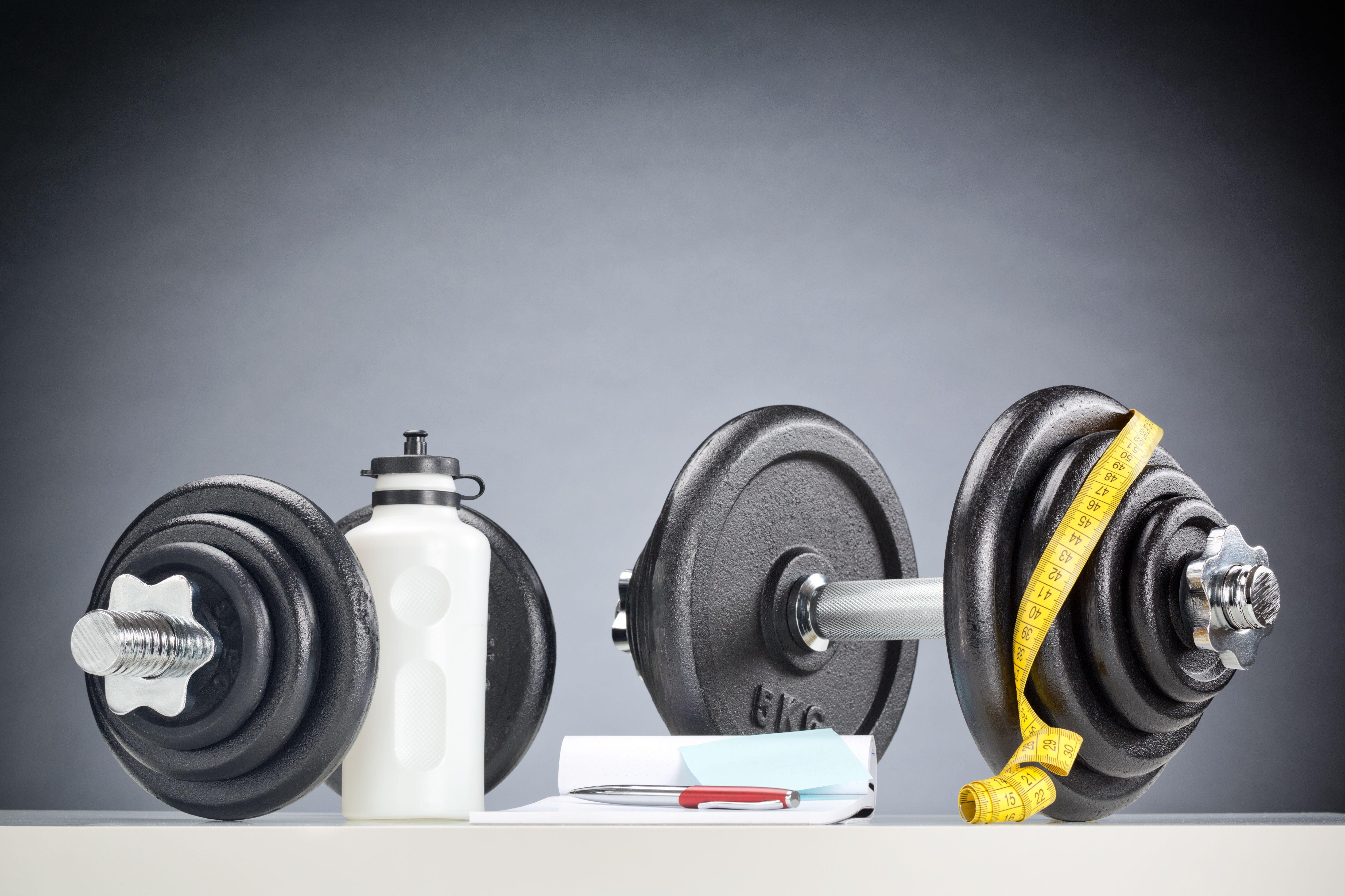 Dumbbells On Black Background In Gym Stock Photo Picture And Royalty Free  Image Image 131025817
