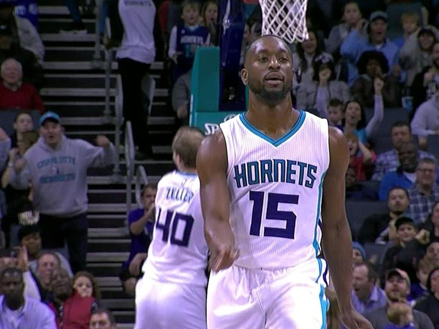 Kemba Walker does emphatic celebration shimmy while his shot rims