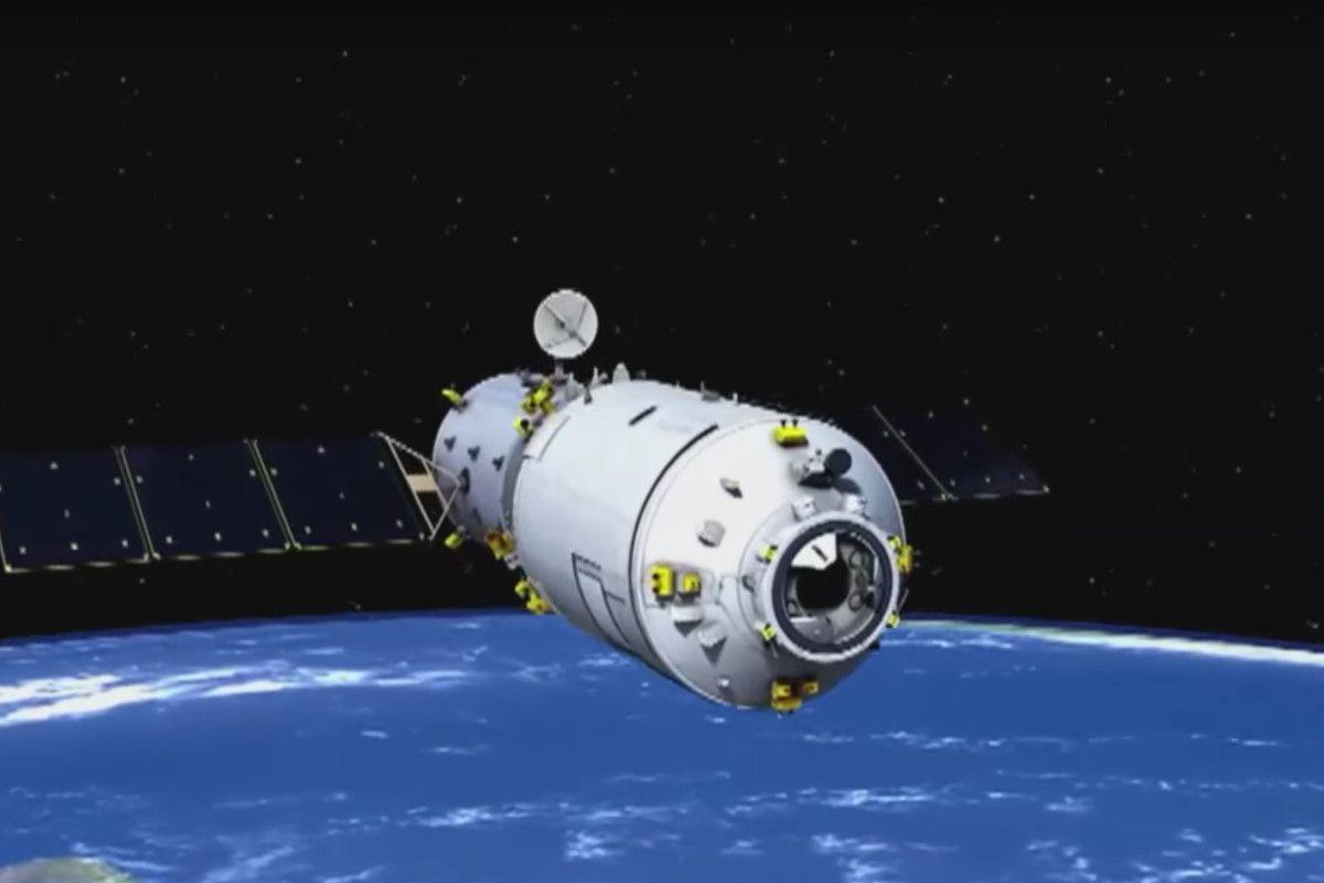 China's first automated cargo spaceship has docked with