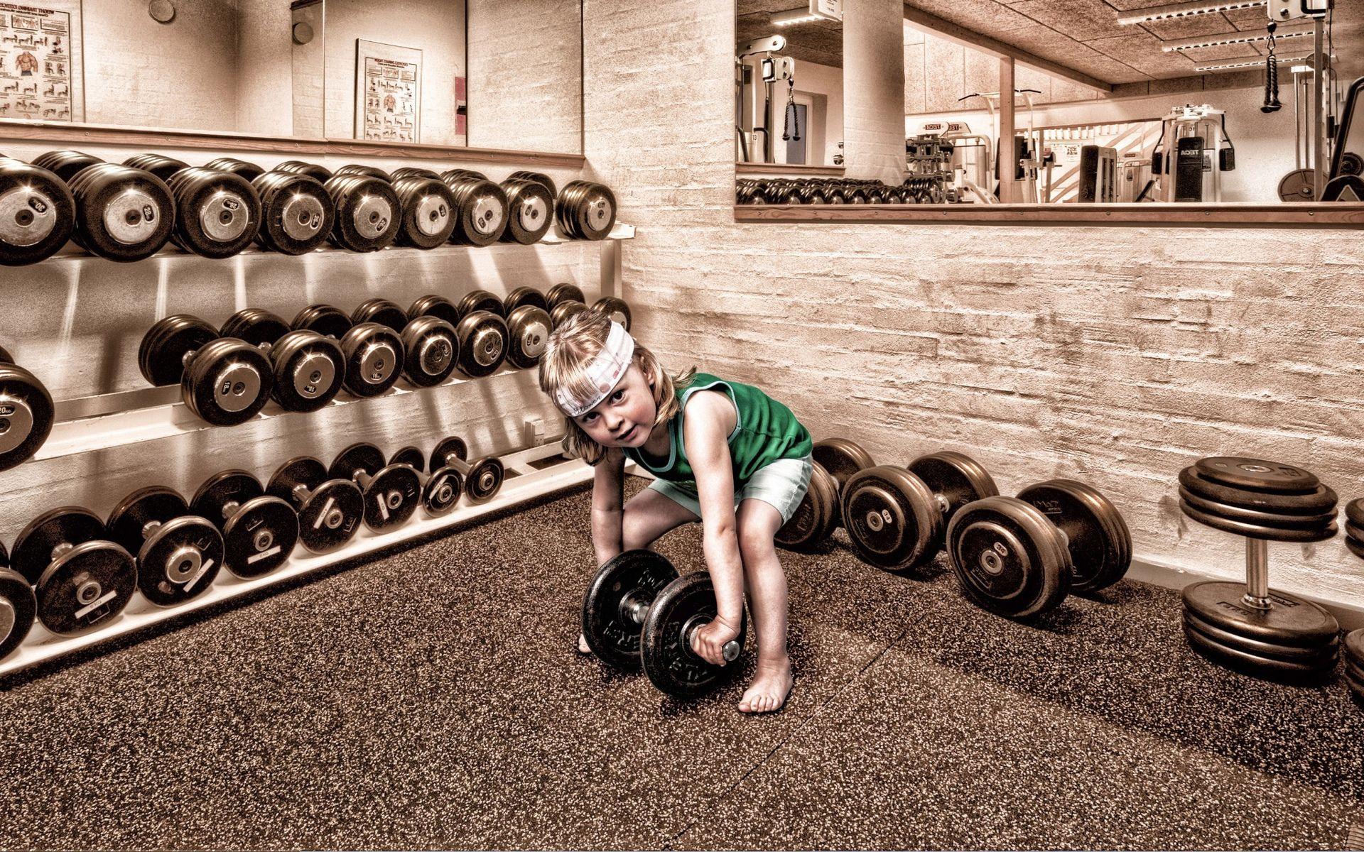 Kid with dumbbells in the gym wallpaper download. Wallpaper