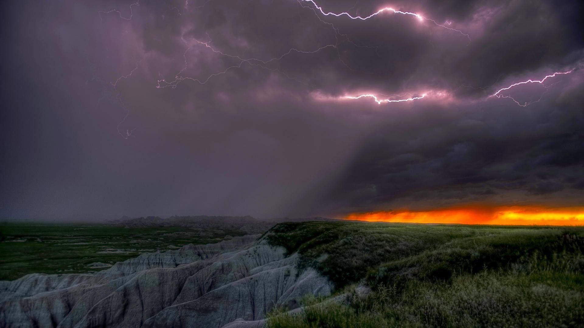 Forces of Nature: Lightning Badlands Storm Rocks Aggressive Clouds