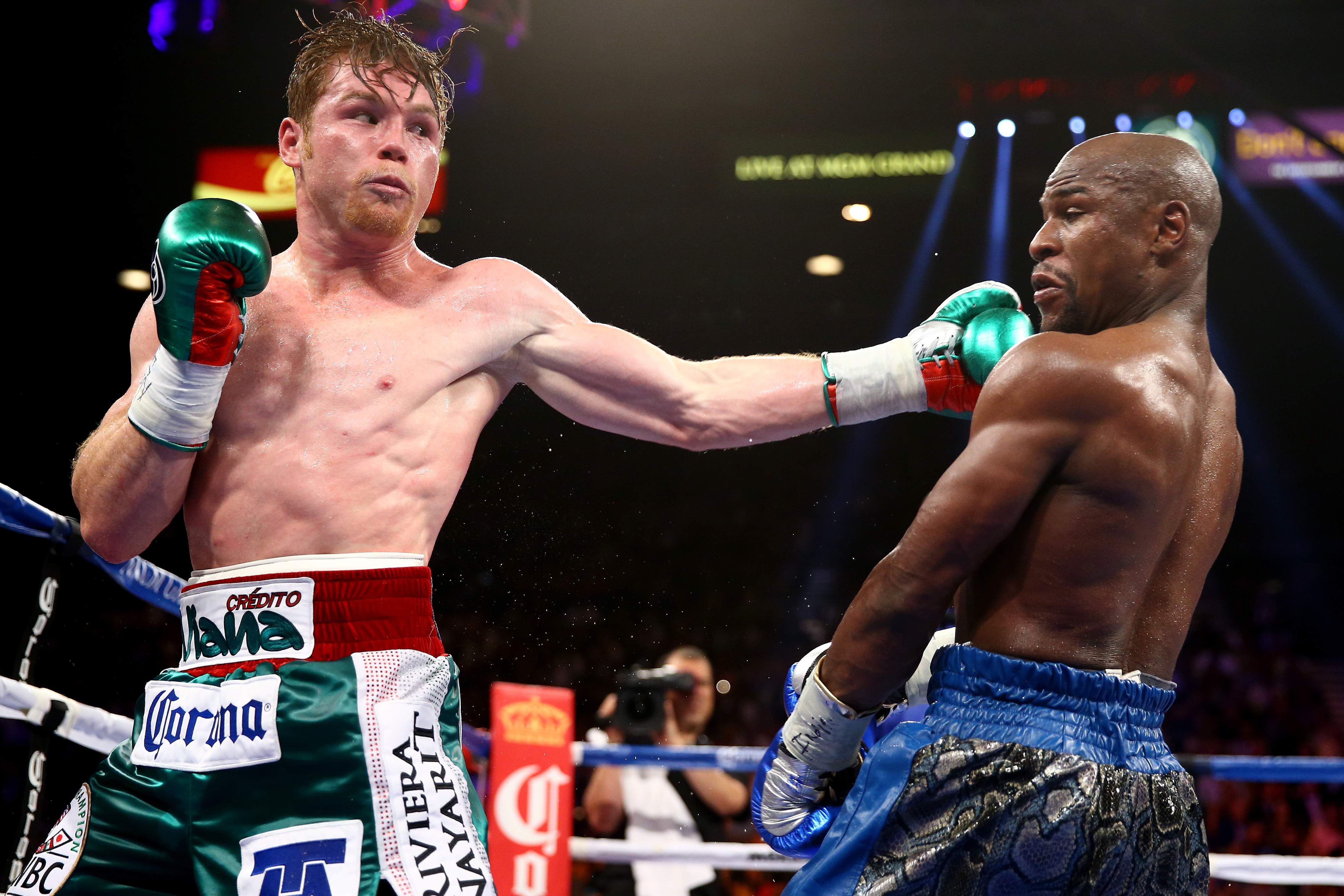 Canelo Alvarez takes a swipe at Floyd Mayweather Jr. during their