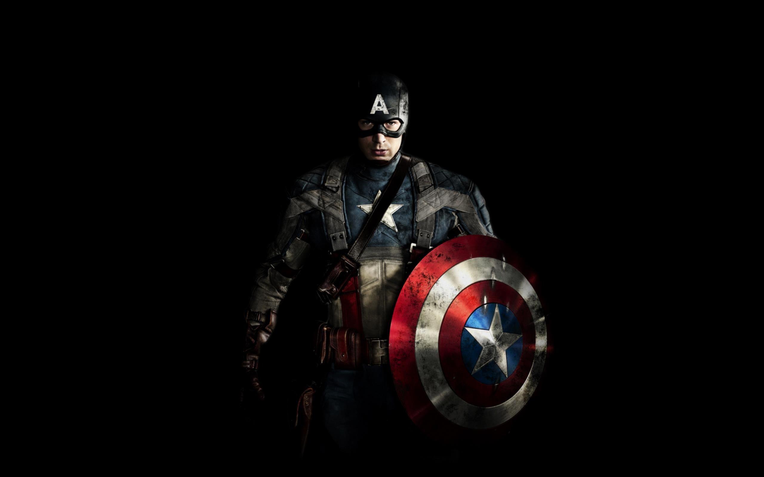 HD image of Captain America standing tall and and waving the flag
