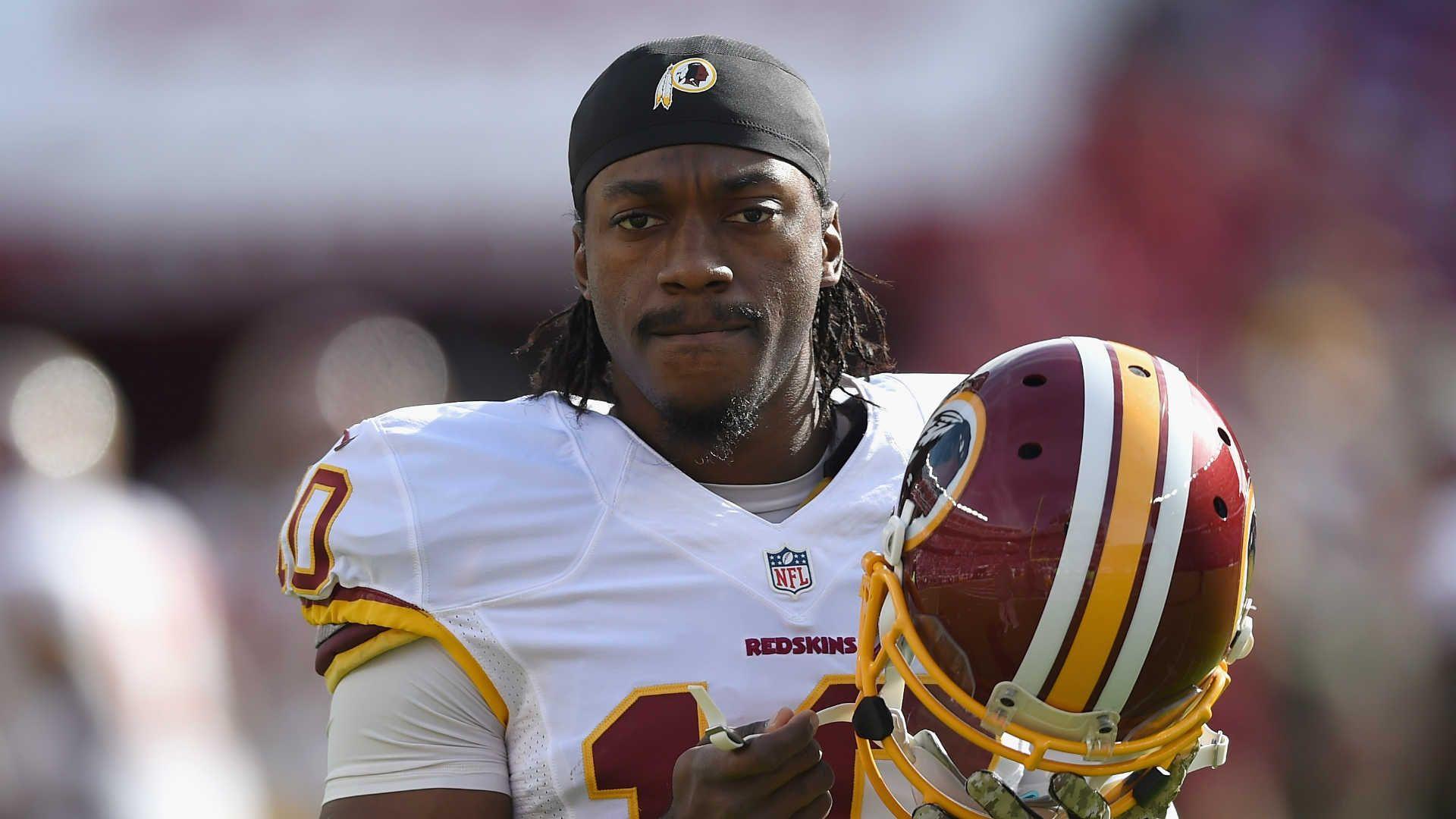 RGIII practices as safety on Redskins' scout team. NFL. Sporting