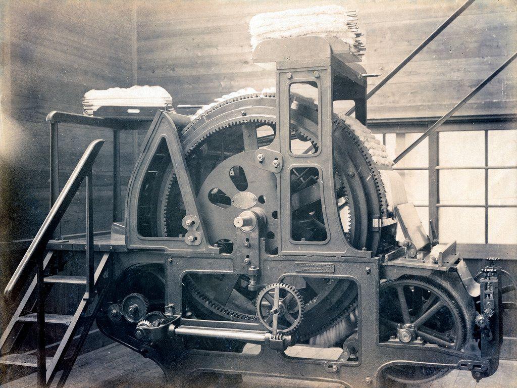 Huge Gear Machine in Japanese Textile Factory. A giant gear