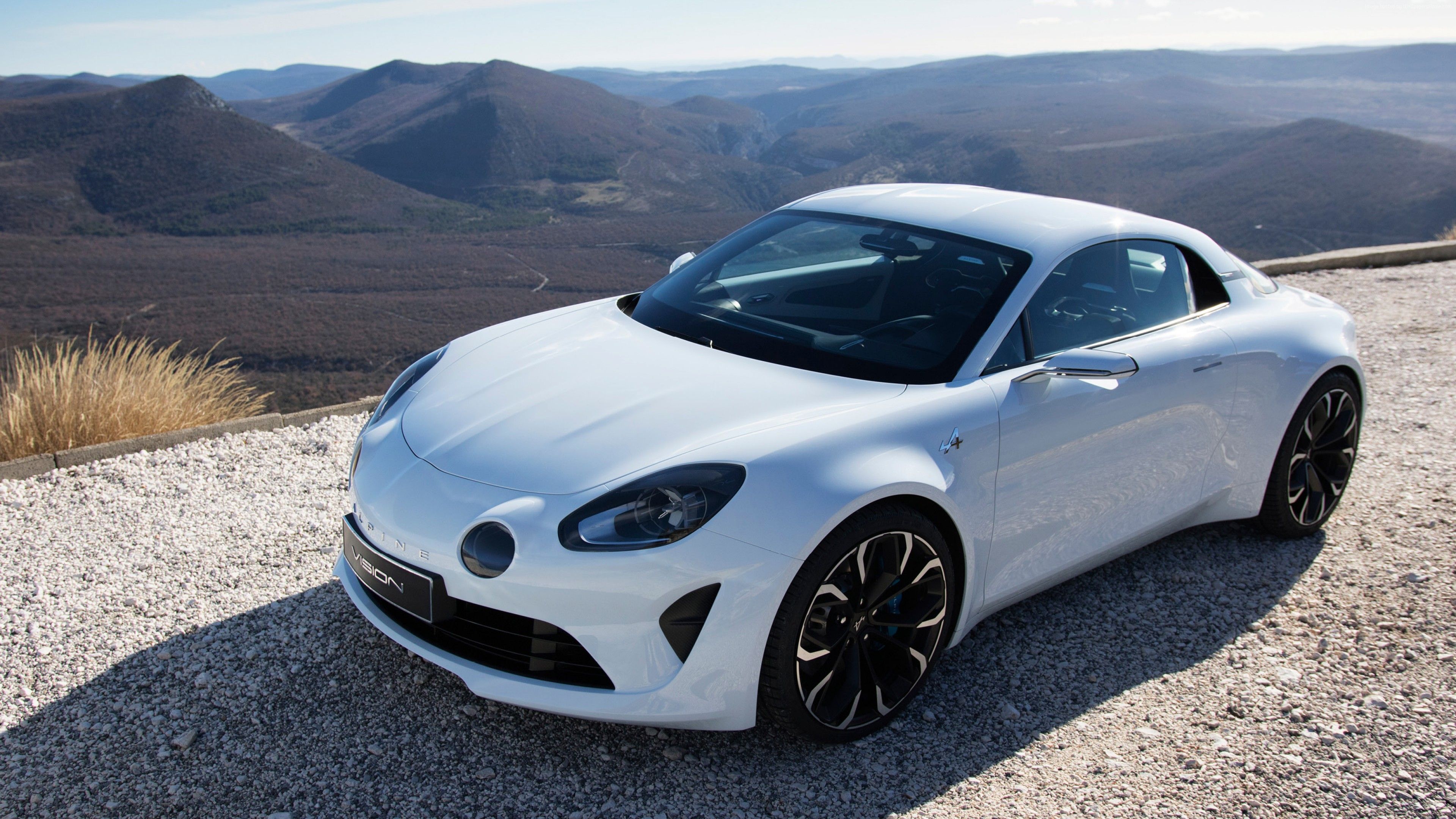 White Alpine A110 on the road wallpaper and image