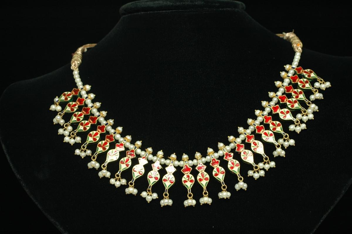 22Kt gold ruby necklace studded with diamonds gold