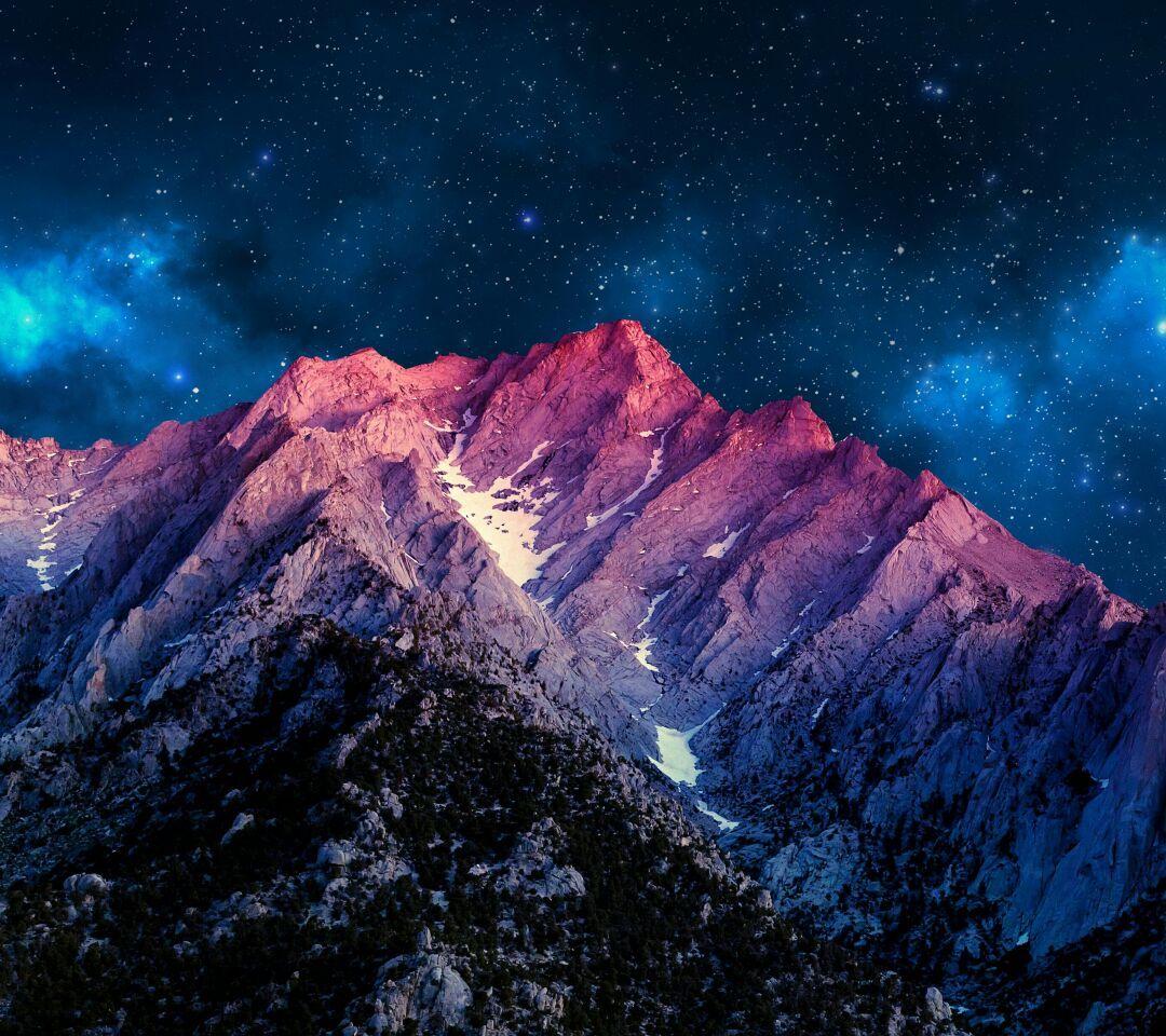 Night sky over mountains