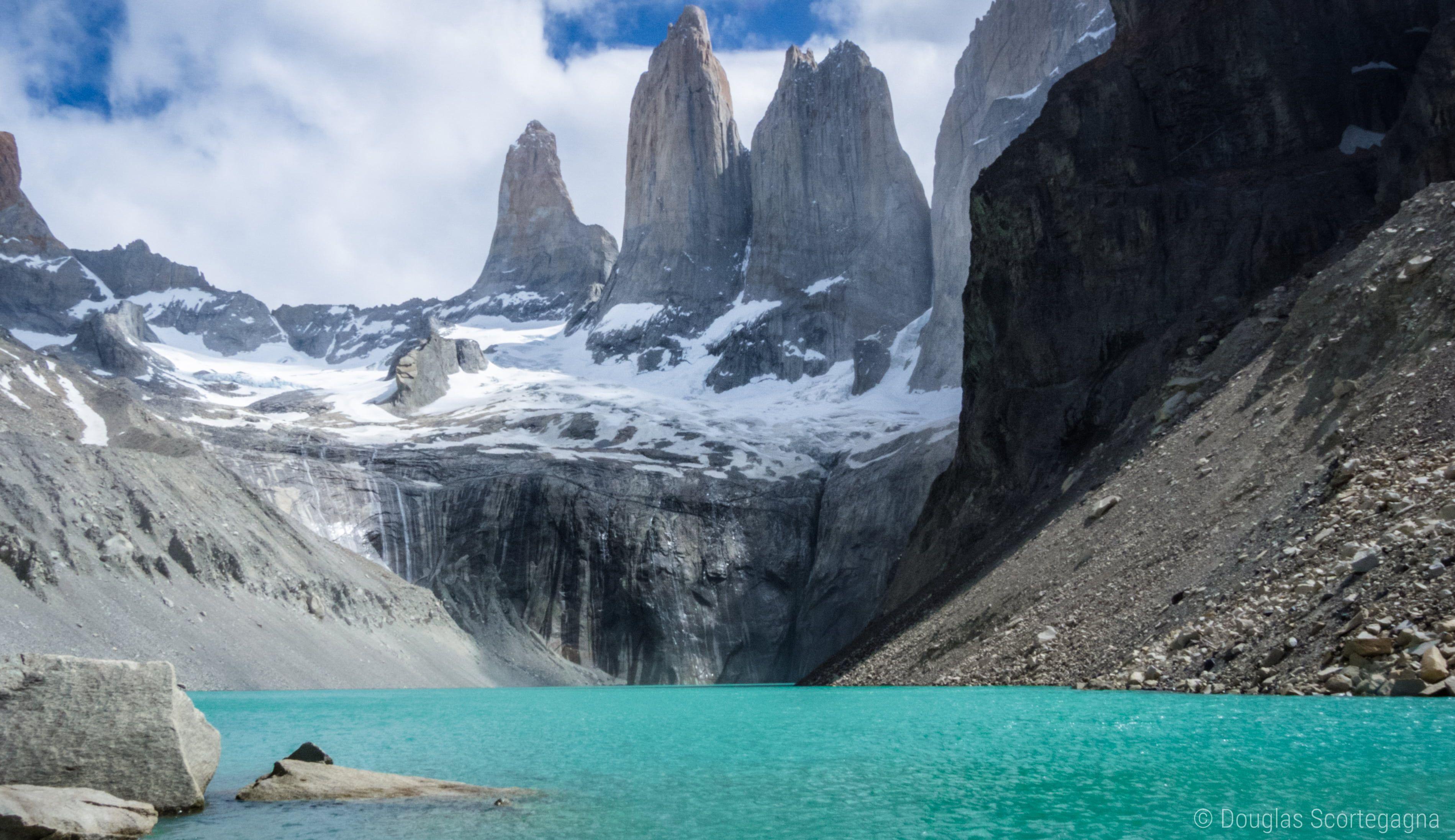 Landscape photo of body of water surrounded by mountains, torres del