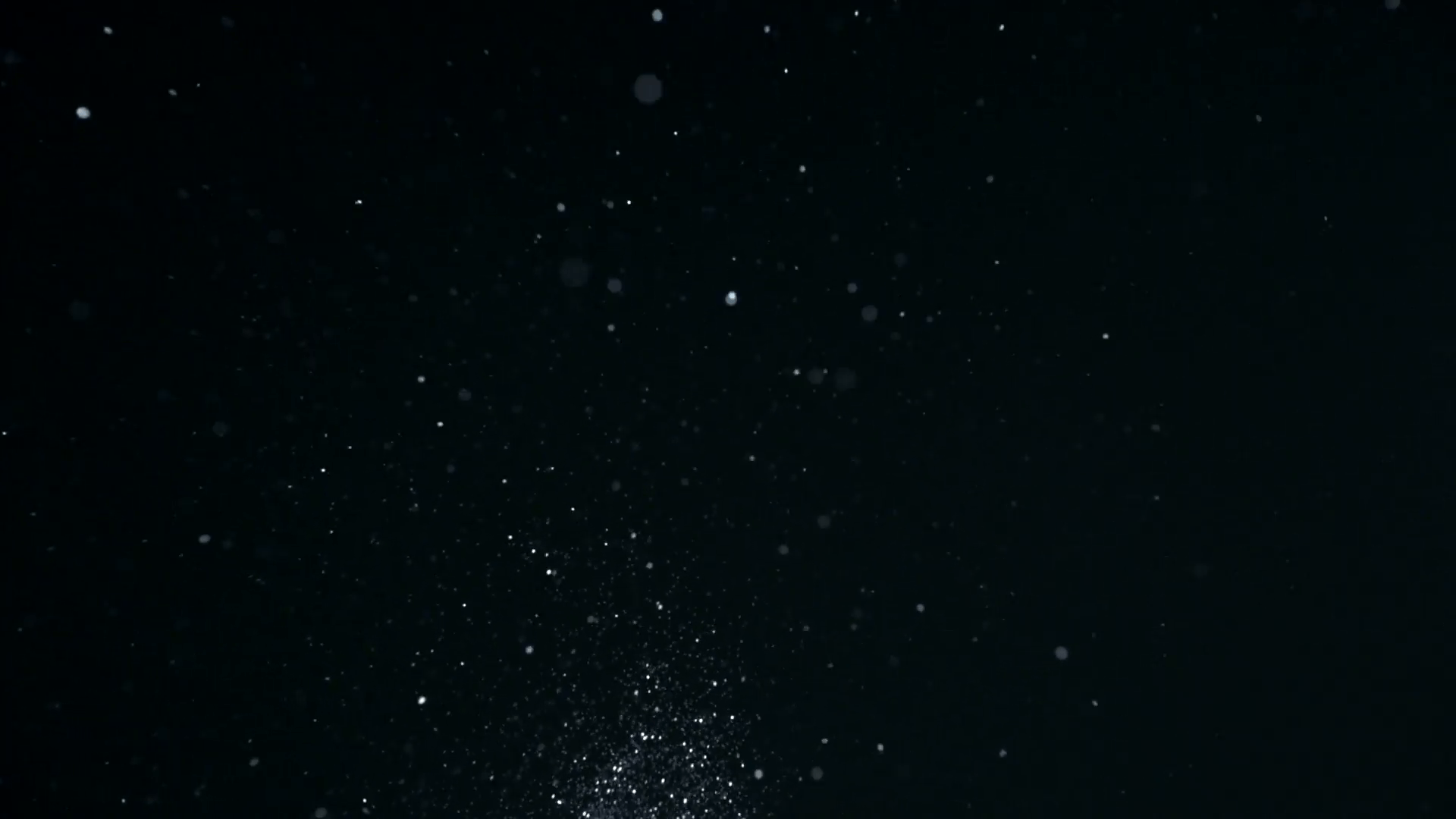 White glitter on black background, Slow Motion Stock Video Footage
