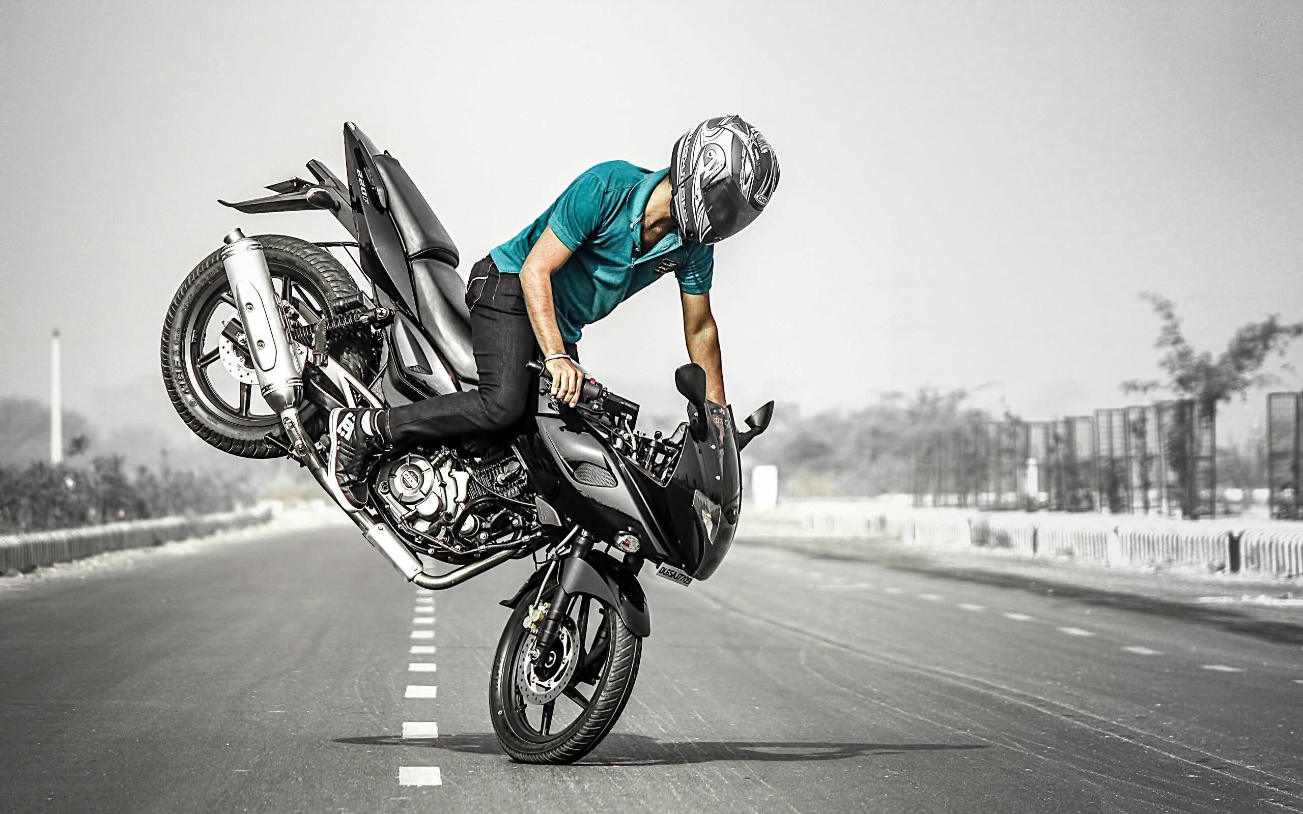 Bike Stunt Man on Road HD Wallpaper HD Wallpaper