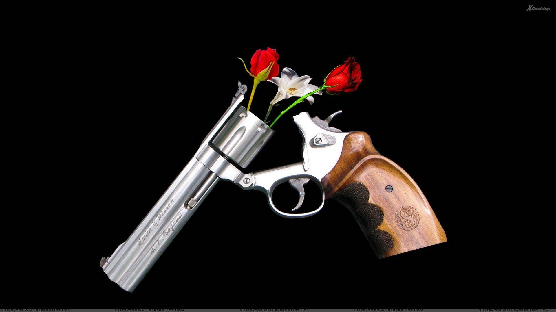 Guns And Roses On Black Background Wallpaper