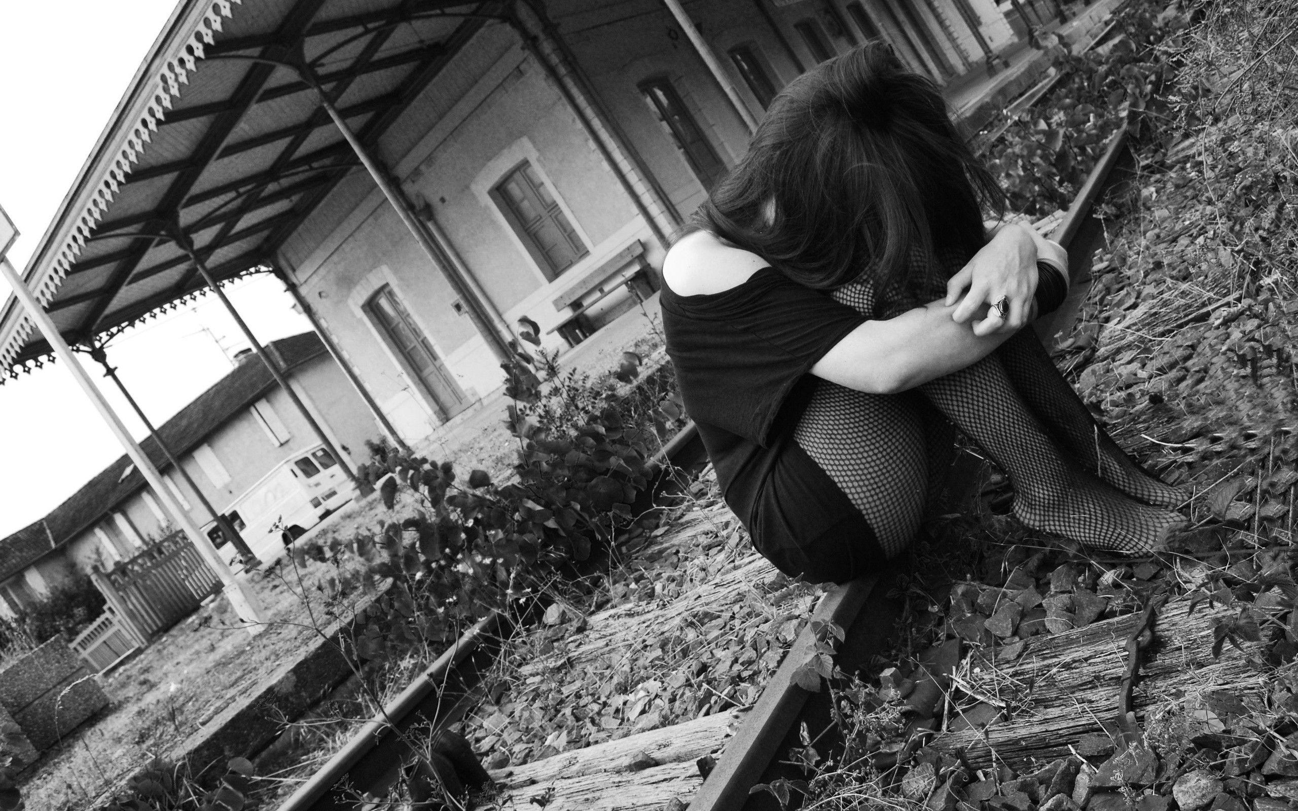 Emo Girl Sitting On The Rails