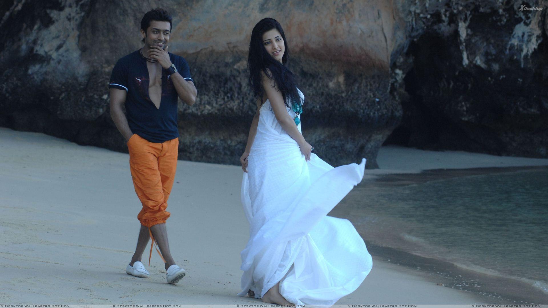 Shruti Haasan In White Long Dress And Surya