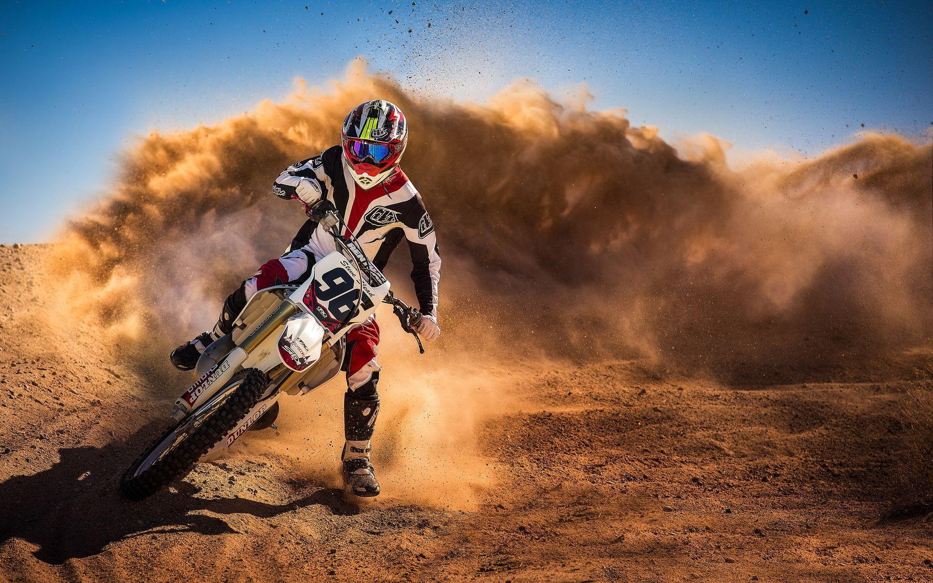 Motocross Biker Mud Racing Wallpaper