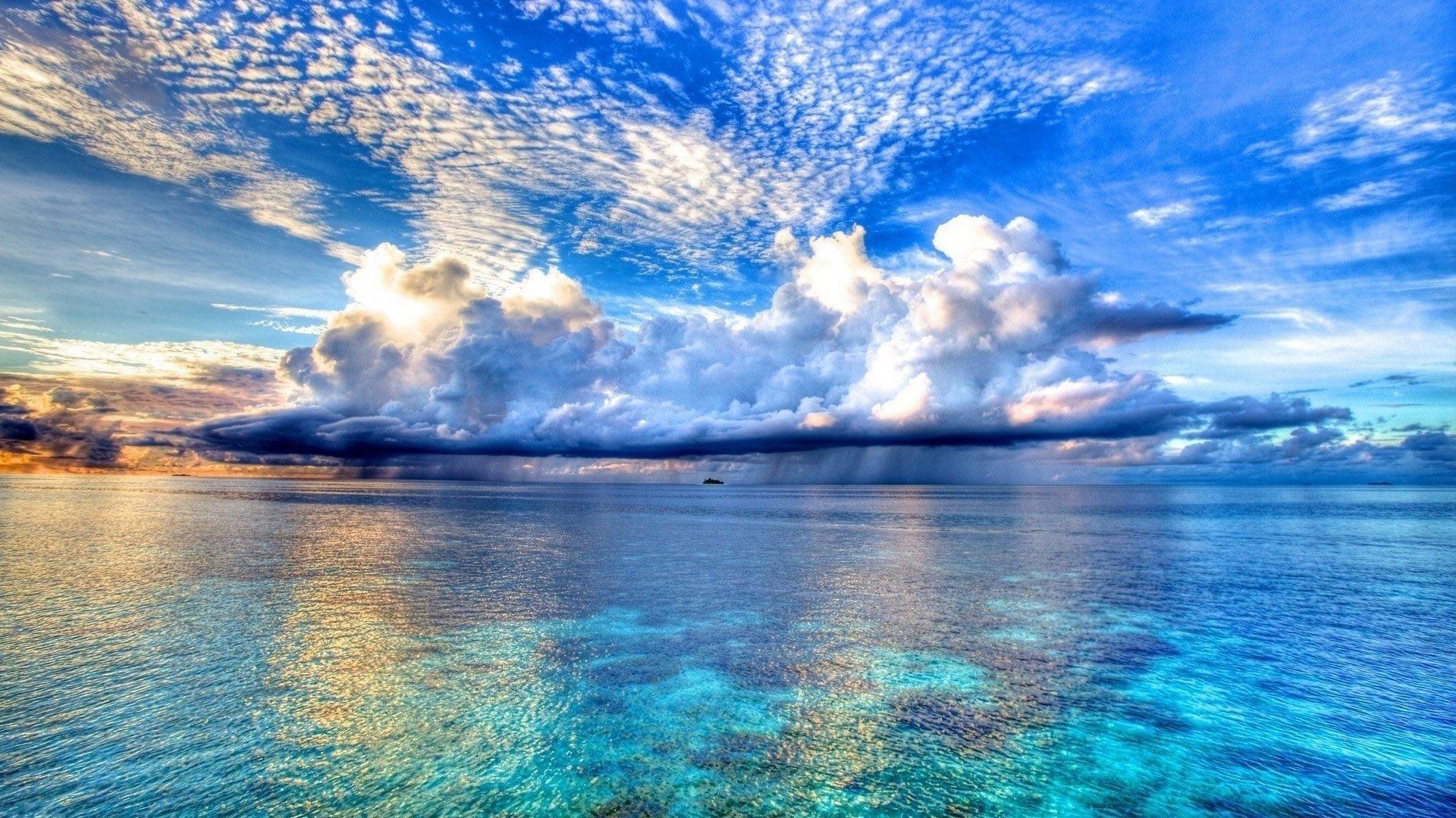 Clouds and Beach Wallpaper