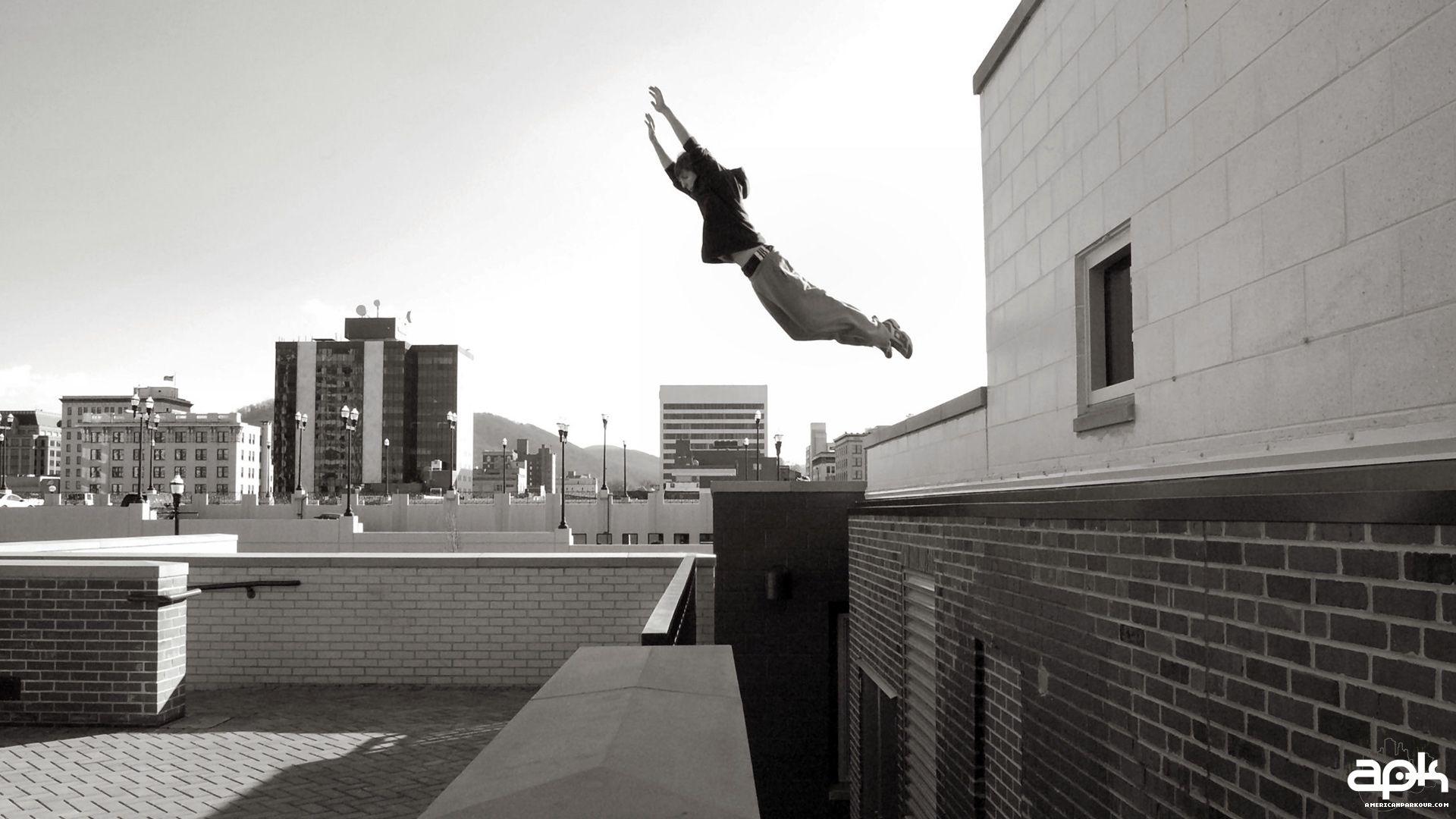 jumping, grayscale, parkour, arms raised wallpaper