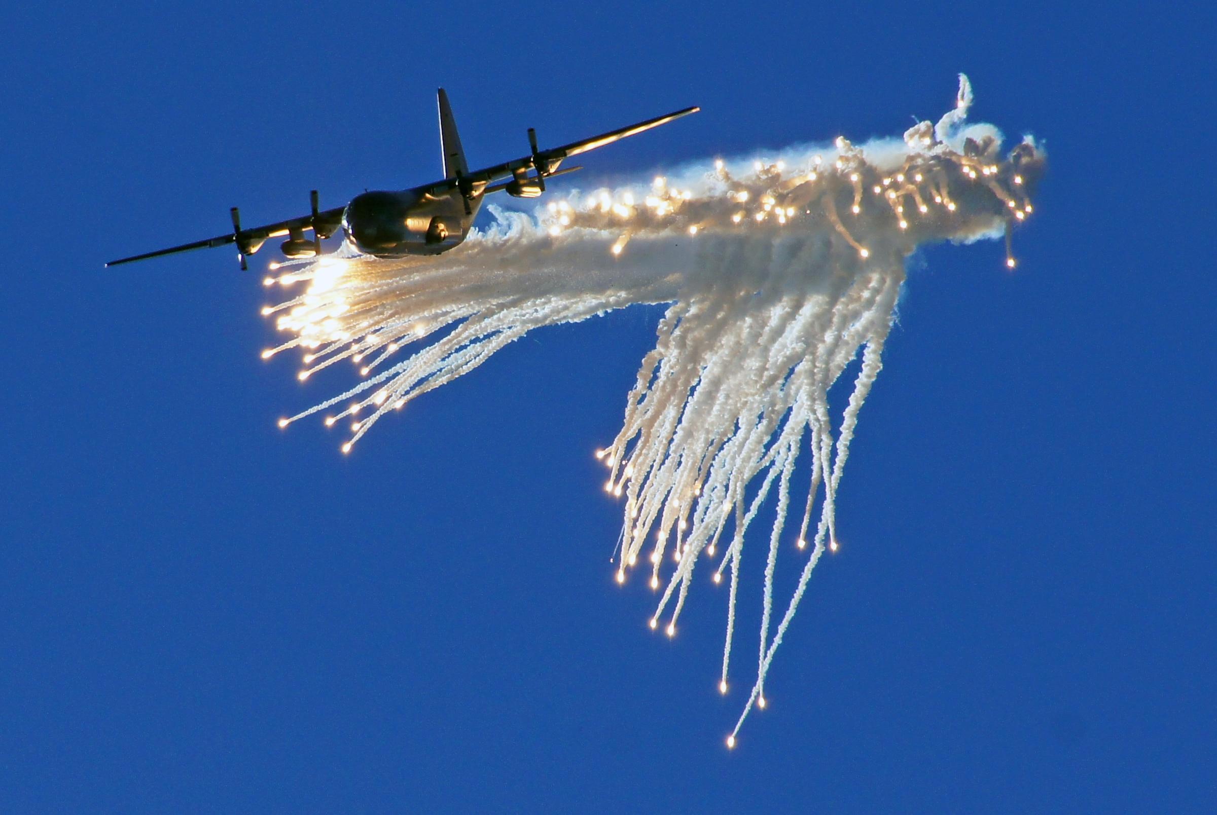 Lockheed C 130 Hercules Dropping Flares.Warbirds Show. Free Image