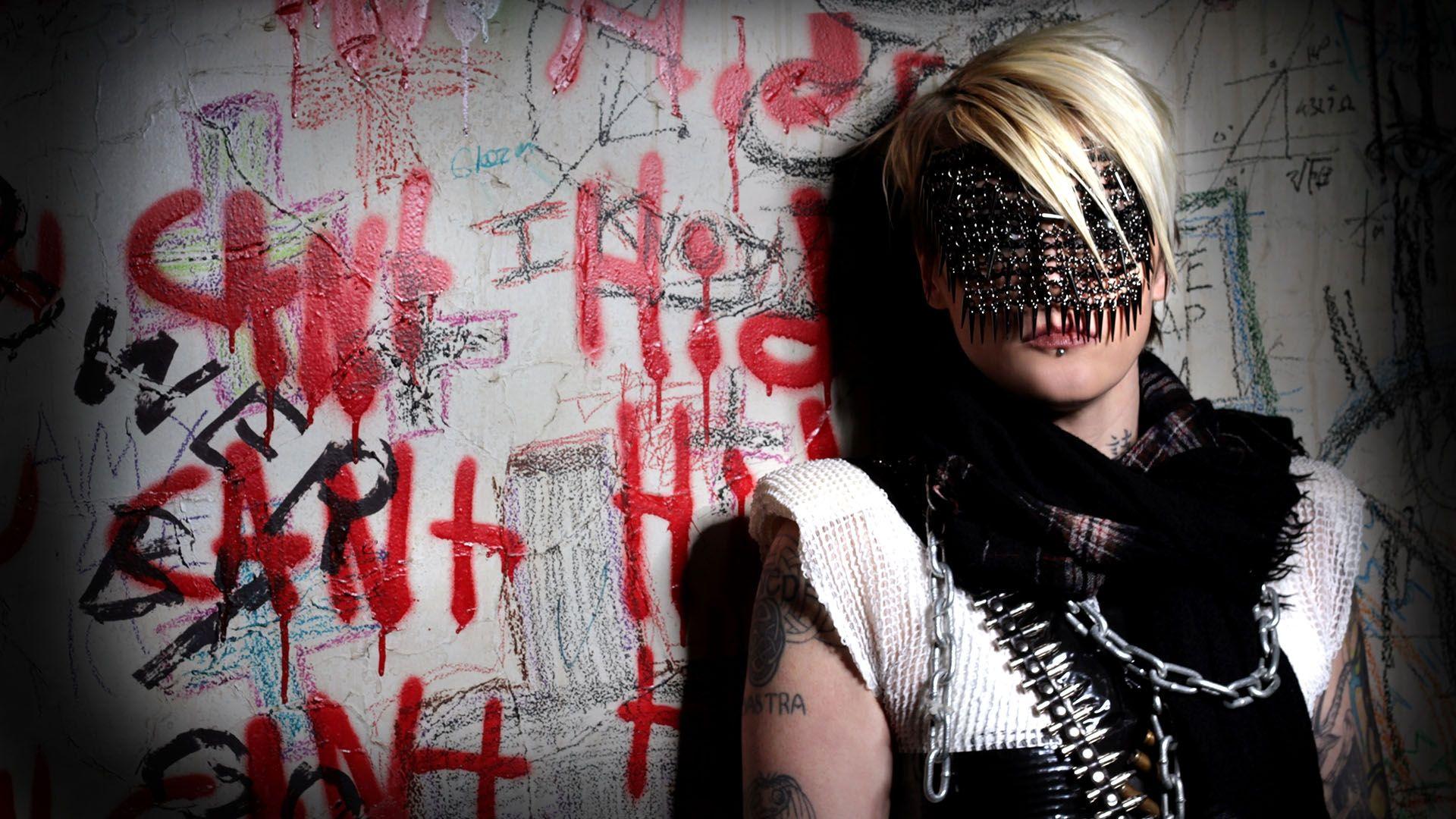 Download Wallpaper 1920x1080 otep, girl, blonde, wall, tattoo Full