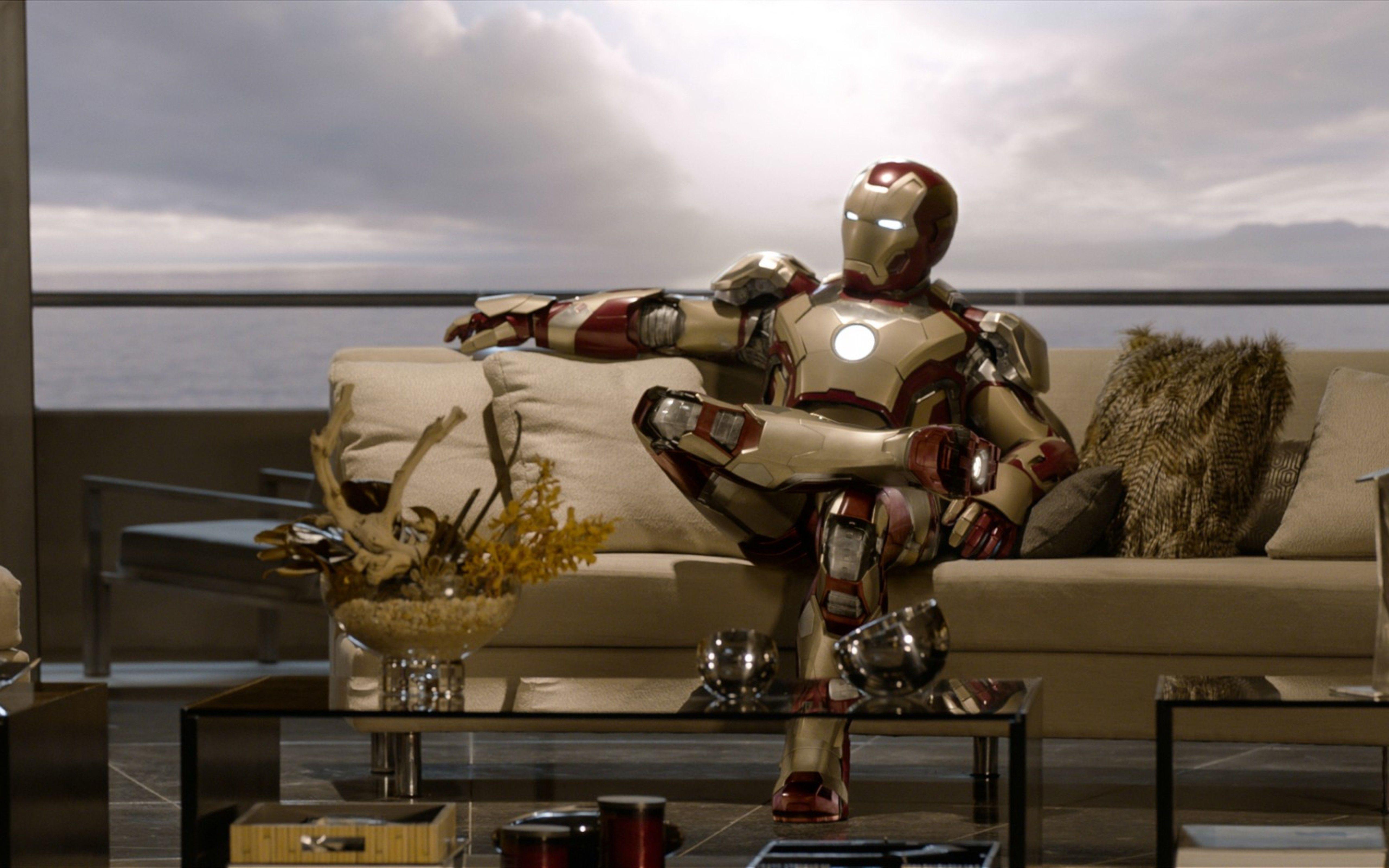 Wallpaper Download 5120x3200 Iron Man sits on a sofa. movies