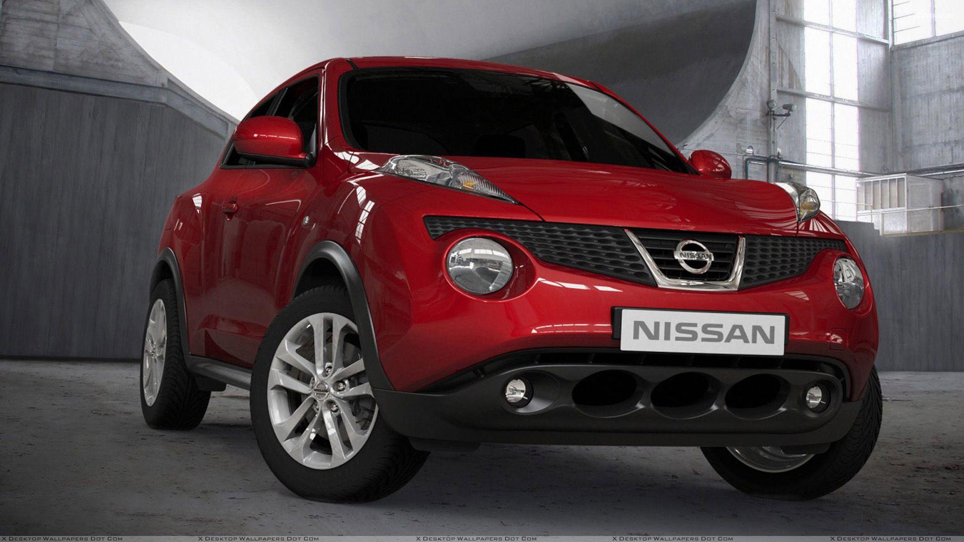 Front Of 2011 Nissan Juke In Red Wallpaper