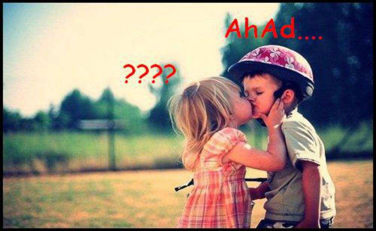 Little Girl Boy Lips Kissing Wallpaper