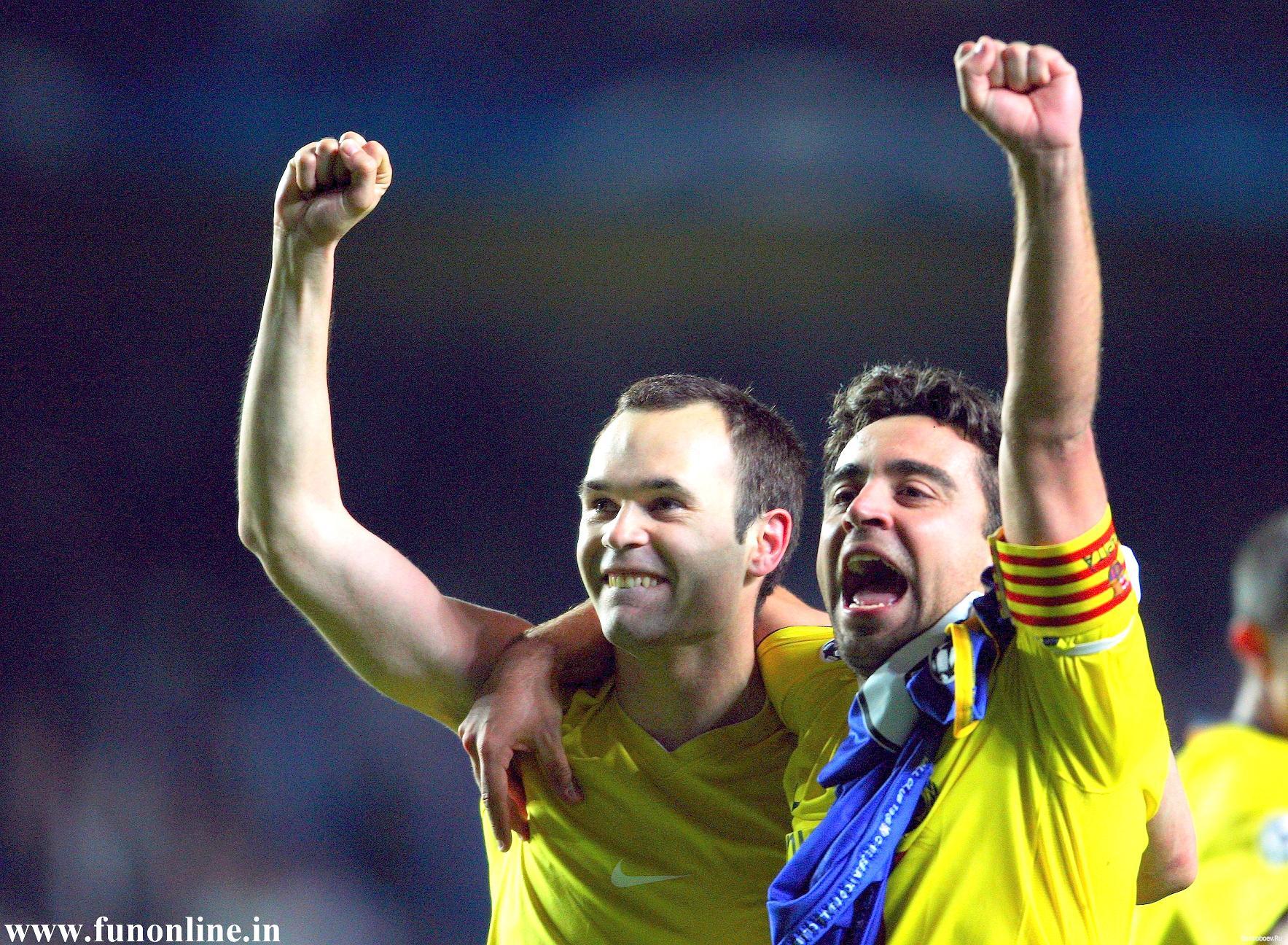 Xavi Hernandez With His FC Barcelona Teammate Andres Iniesta. Of