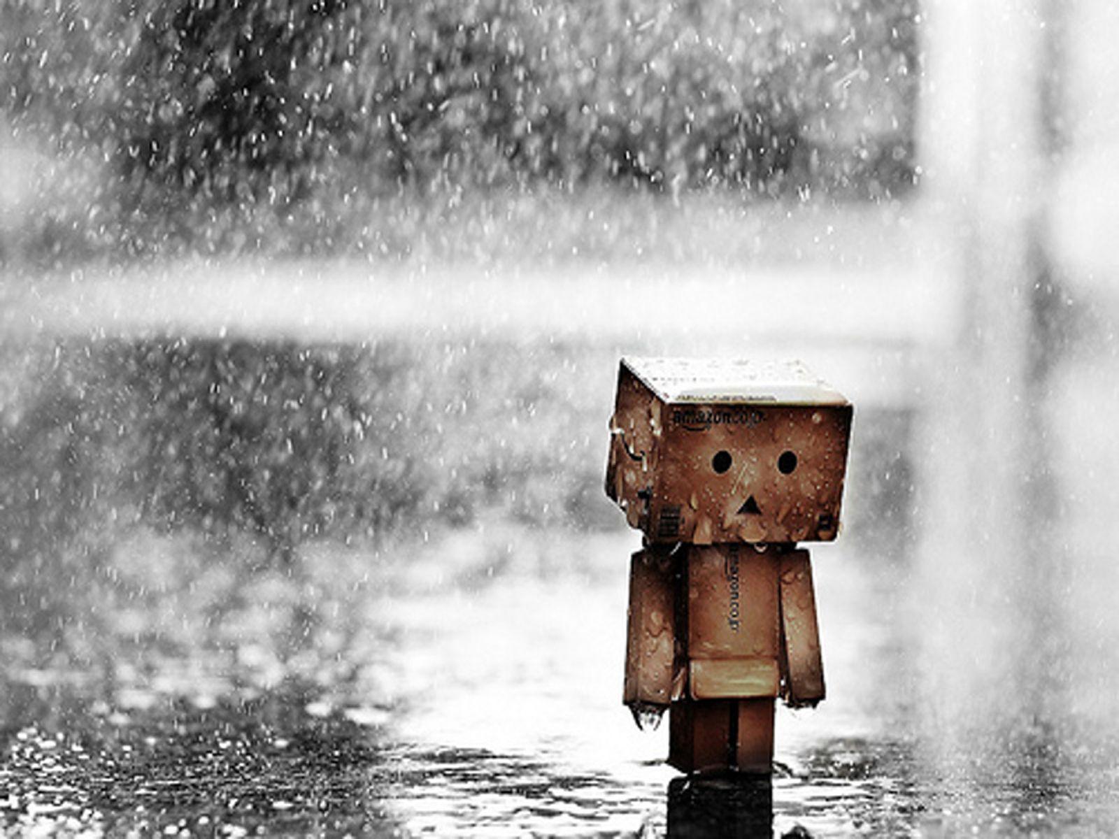 sad boy in the rain